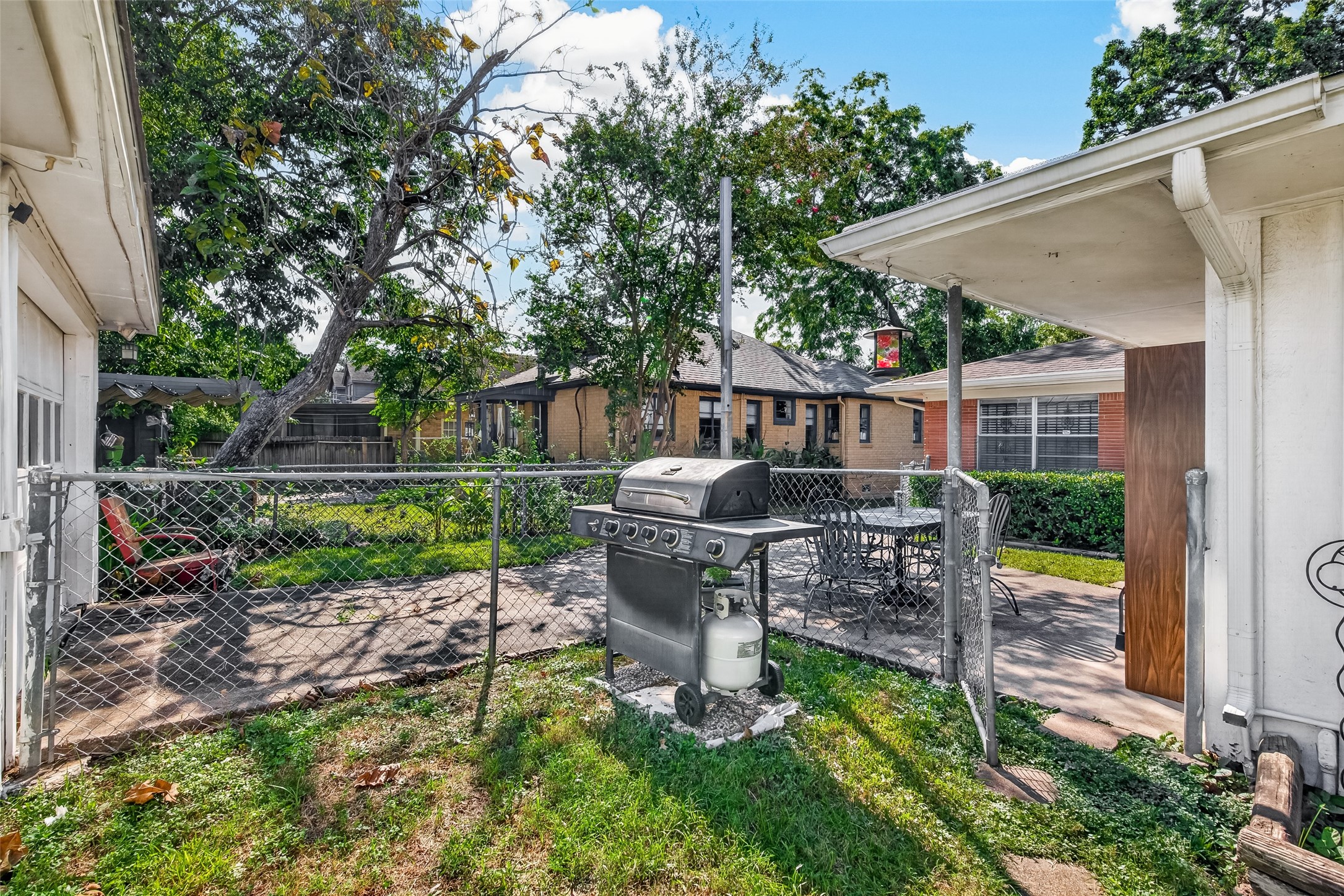 Side yard and single driveway.