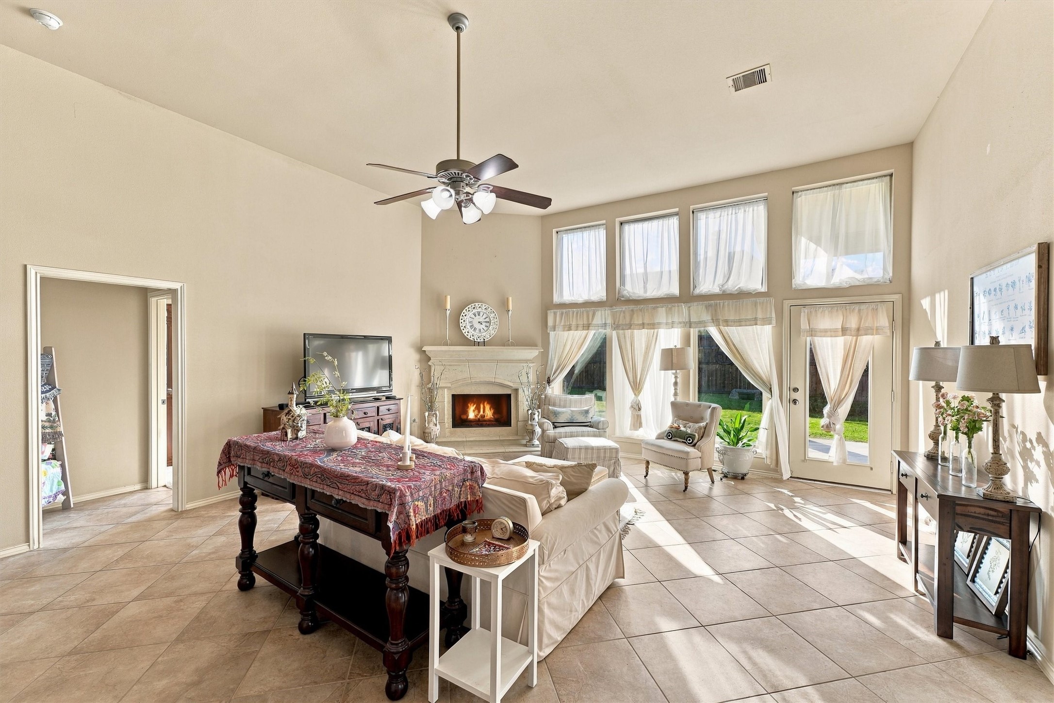 Ample and bright family room overlooking the backyard.