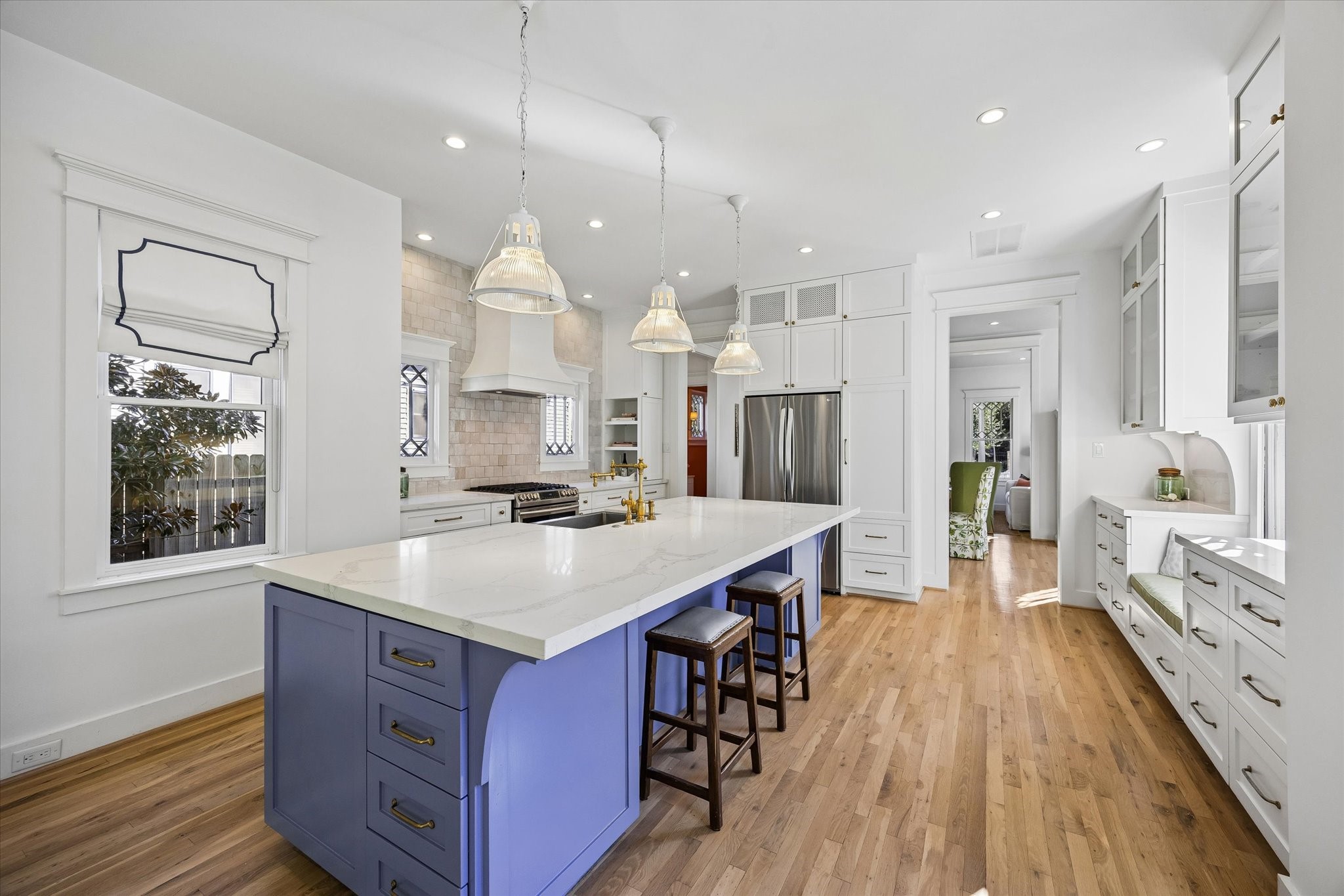 CHEF'S KITCHEN WITH QUARTZ COUNTERS AND STAINLESS STEEL APPLIANCES