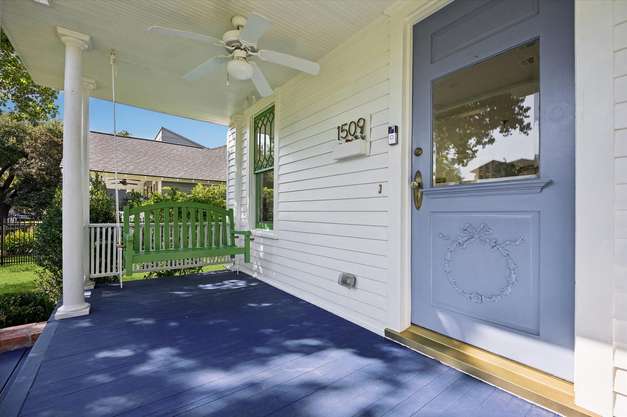 COVERED FRONT PORCH GREETS YOU IN TO THE HOME