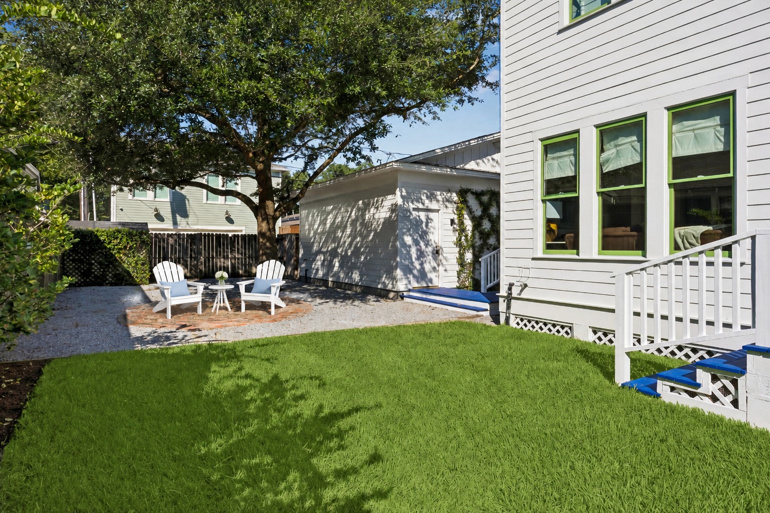 BACKYARD FEATURES A BRICK PATIO