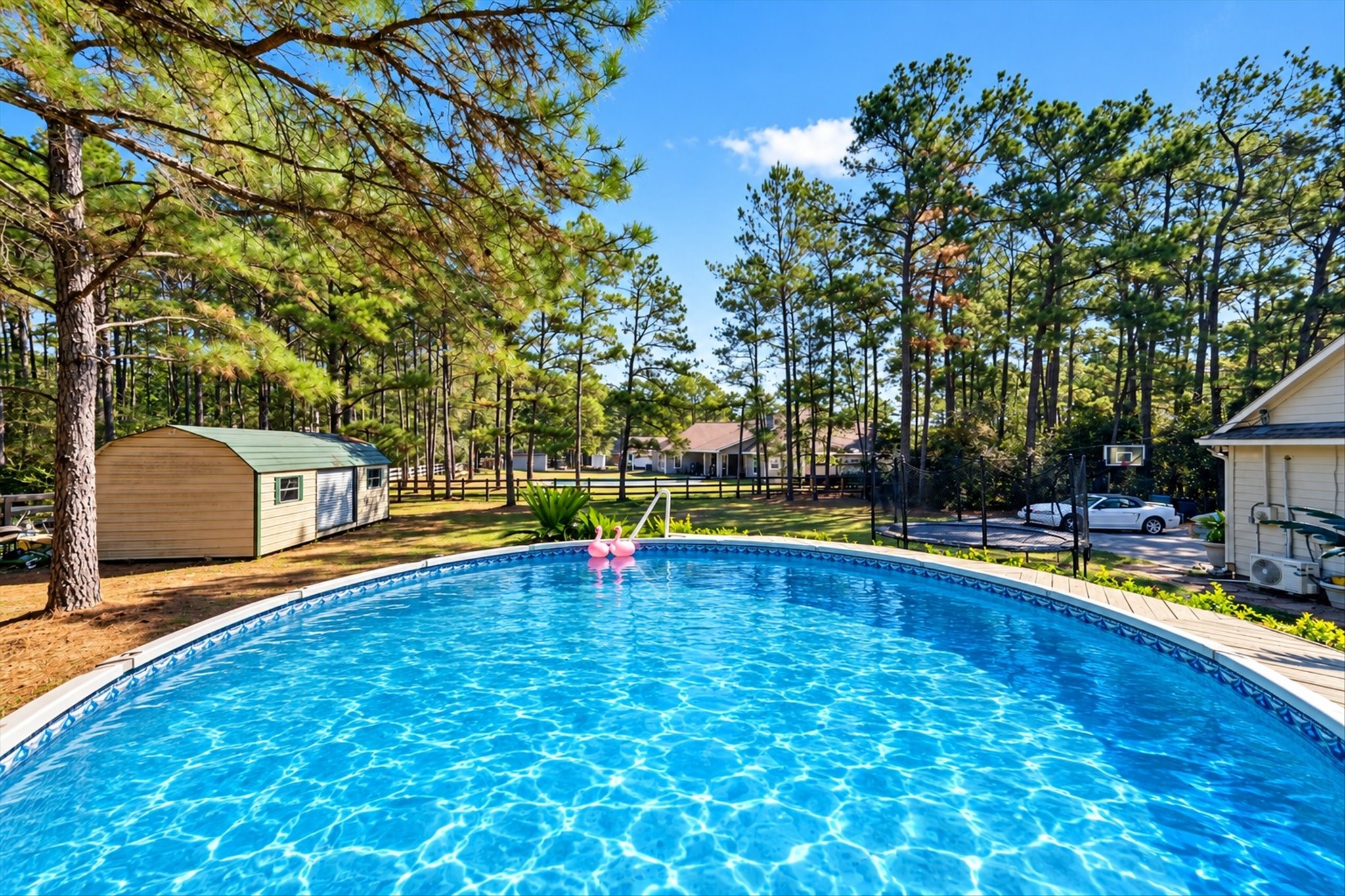 Welcome Home to 19902 Ruby Terrace Ln. Relax by your above-ground pool (visually enhanced photo)