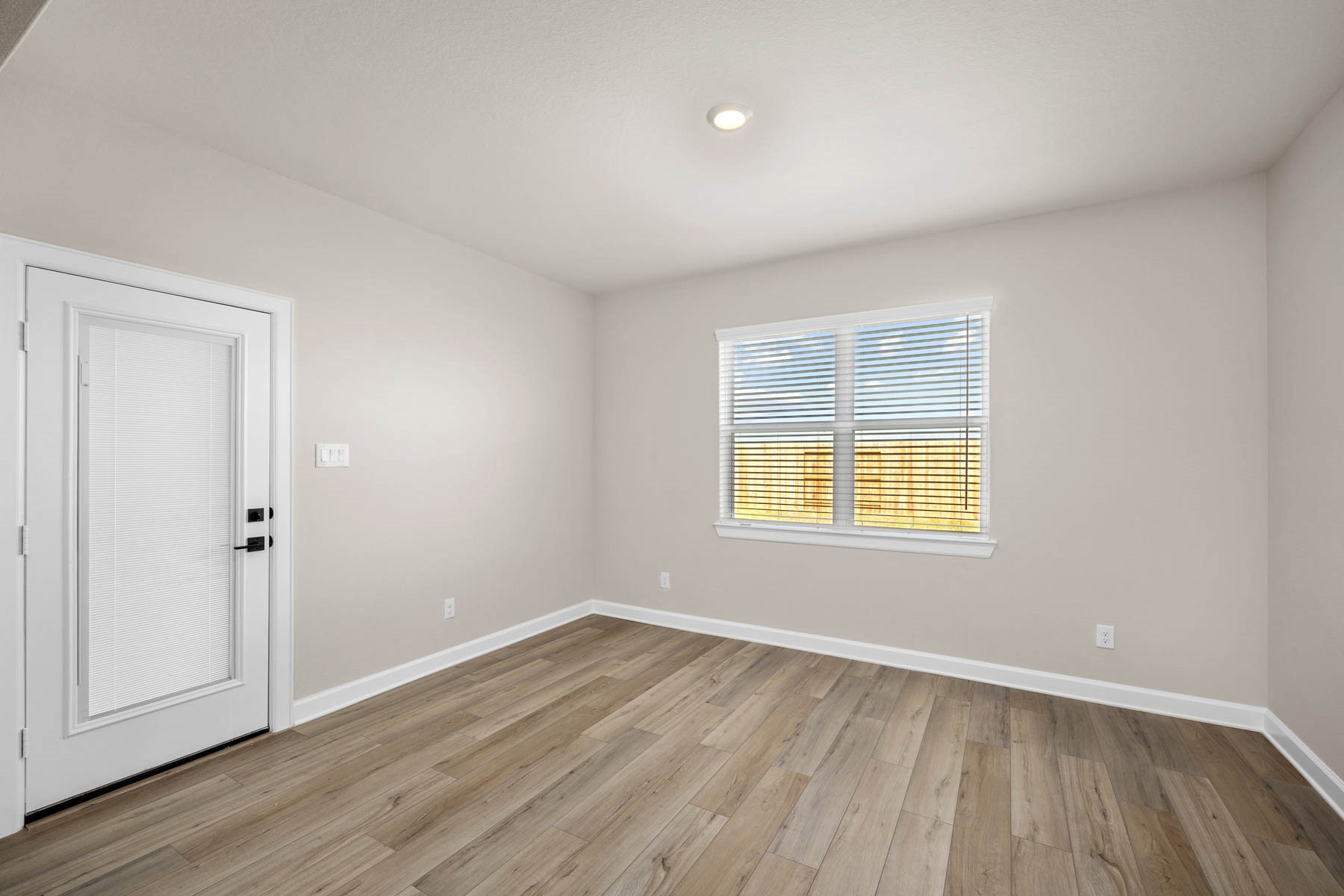 The dining room is located just off from the kitchen, making hosting holiday meals a breeze.