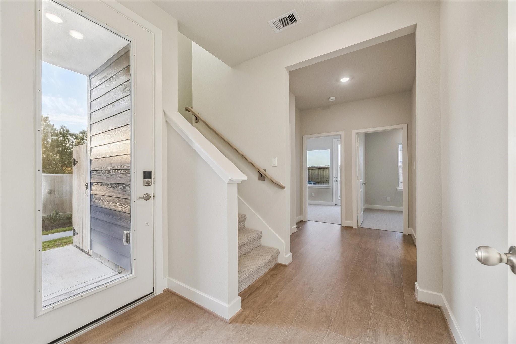 Welcome to the inviting foyer of 24412 Colonial Mound!