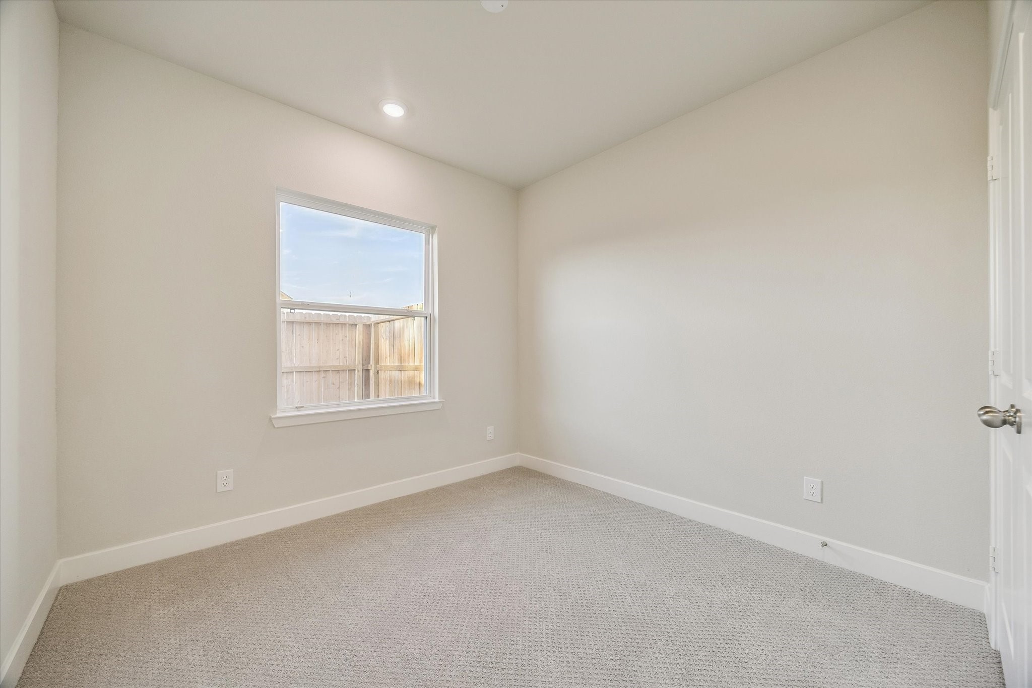 One of two secondary bedrooms