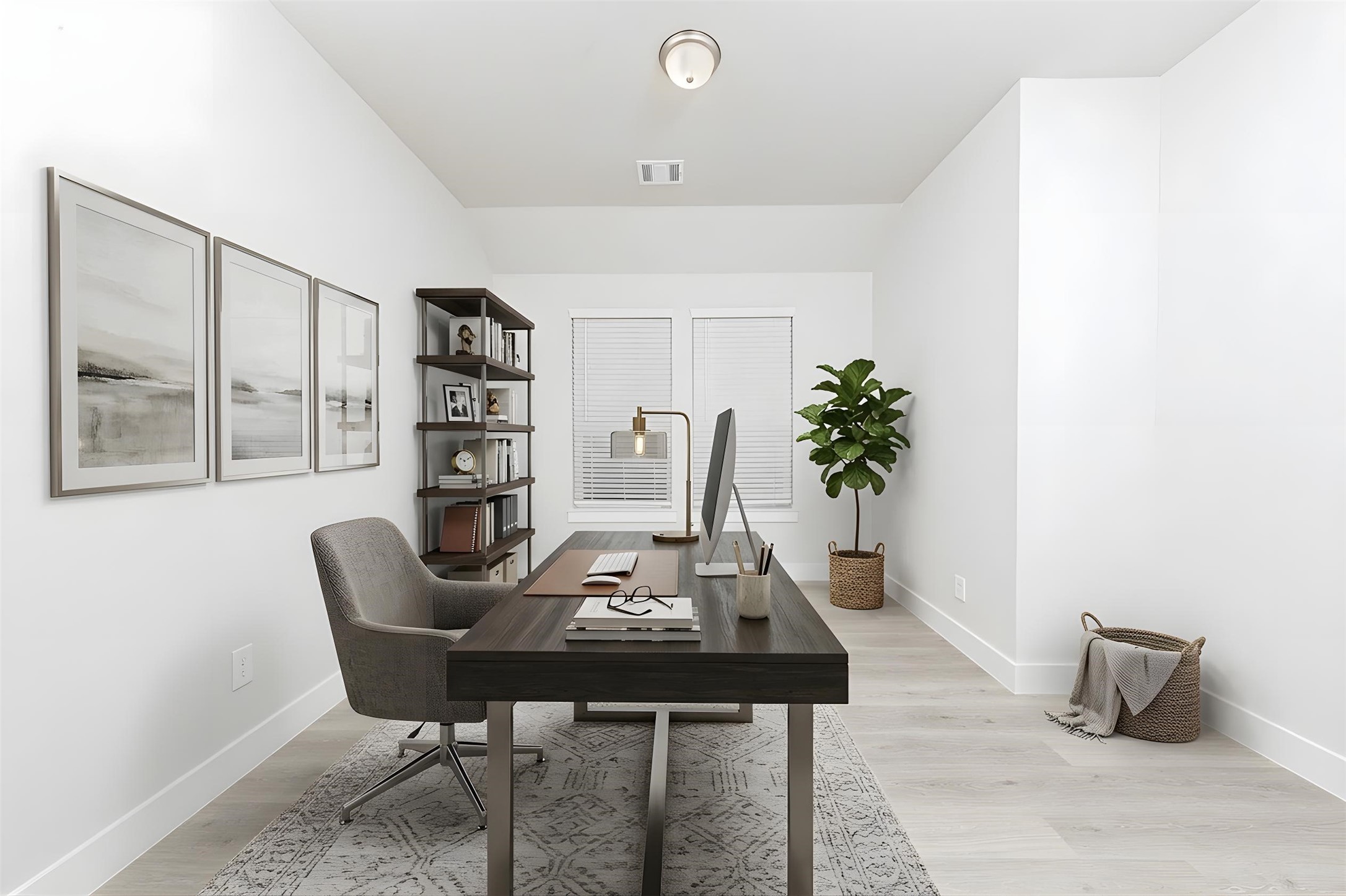 This dedicated home office offers a flexible layout, centered around a thoughtfully designed, integrated wall niche perfect for a desk setup or built-in shelving, providing a seamless and uncluttered work environment. *Virtually Staged