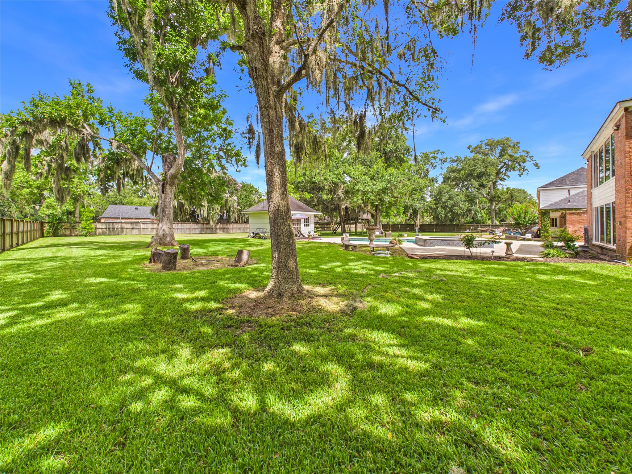 Mature trees in large backyard