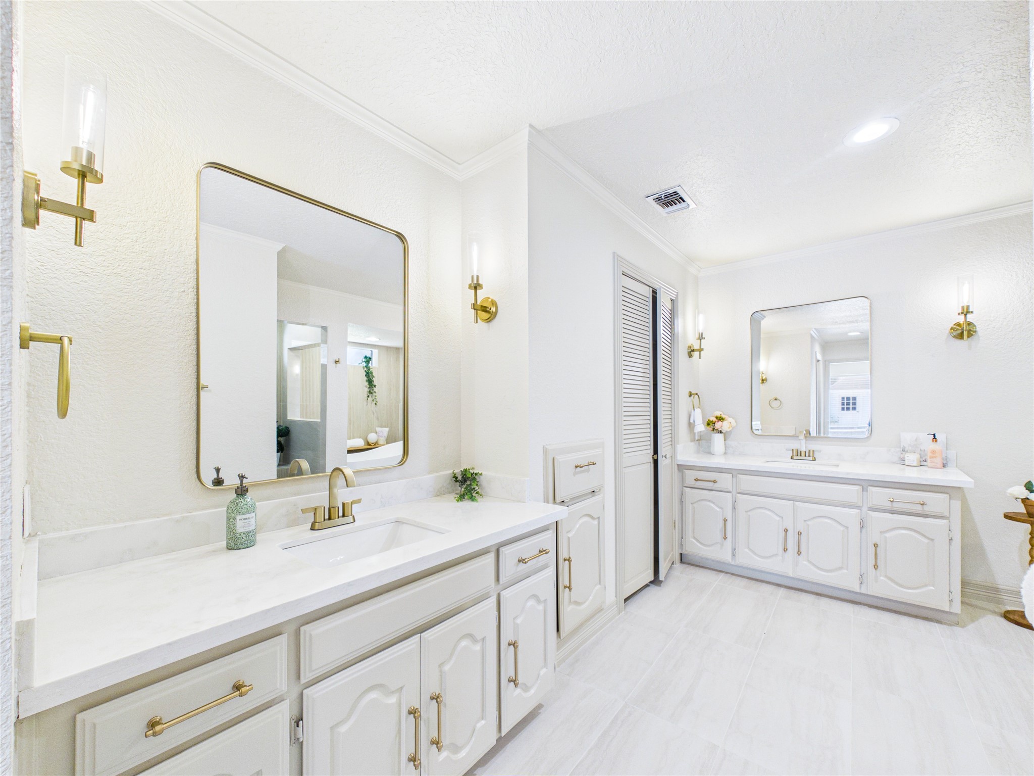 Updated cabinets, quarty countertops and fixtures in main bathroom