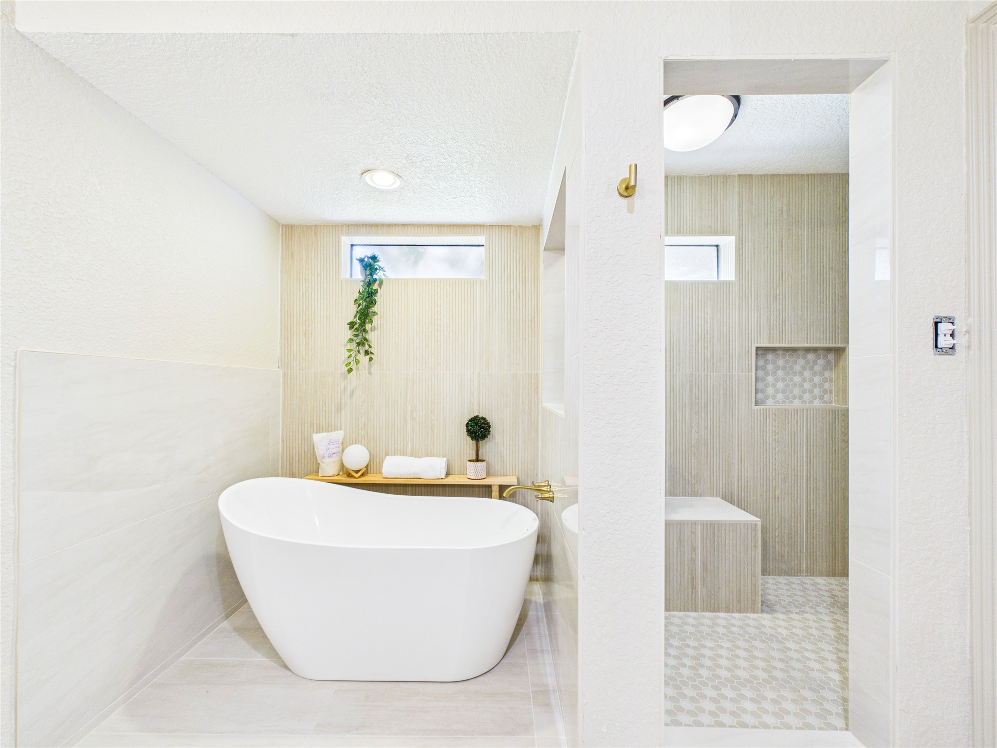 Renovated main bathroom with large shower and soaking tub