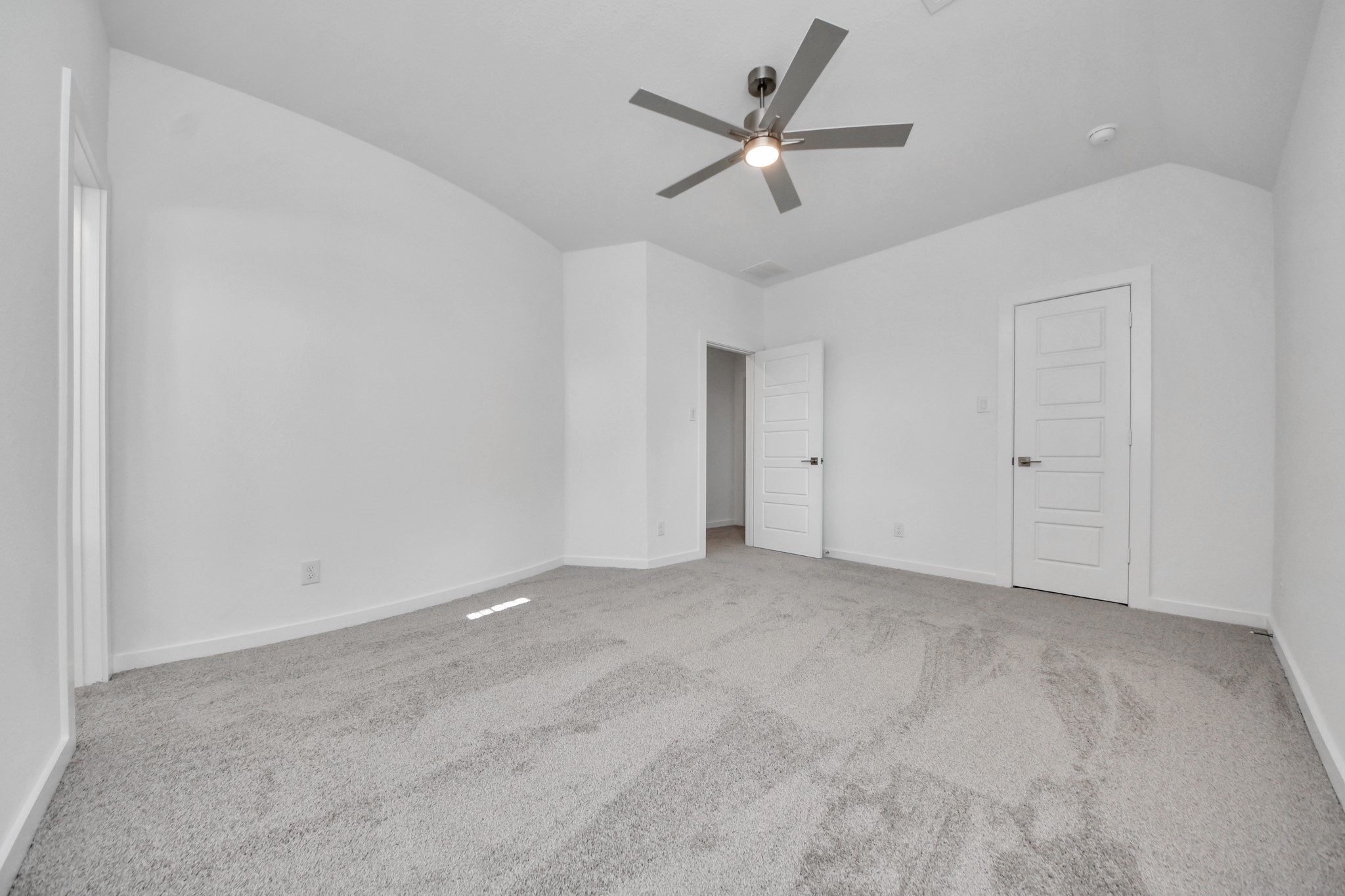 Generously sized secondary bedrooms featuring spacious closets, soft and inviting carpeting underfoot, large windows allowing plenty of natural light, and the added touch of privacy blinds for your personal retreat.