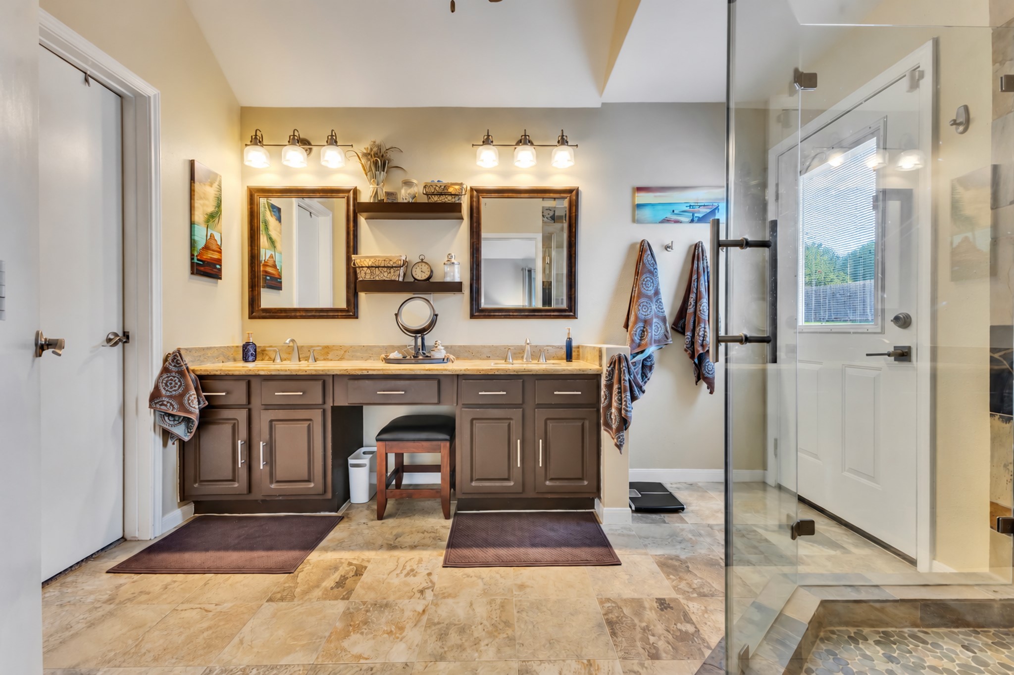 Completely updated primary bath, includes a door to the outside pool area.