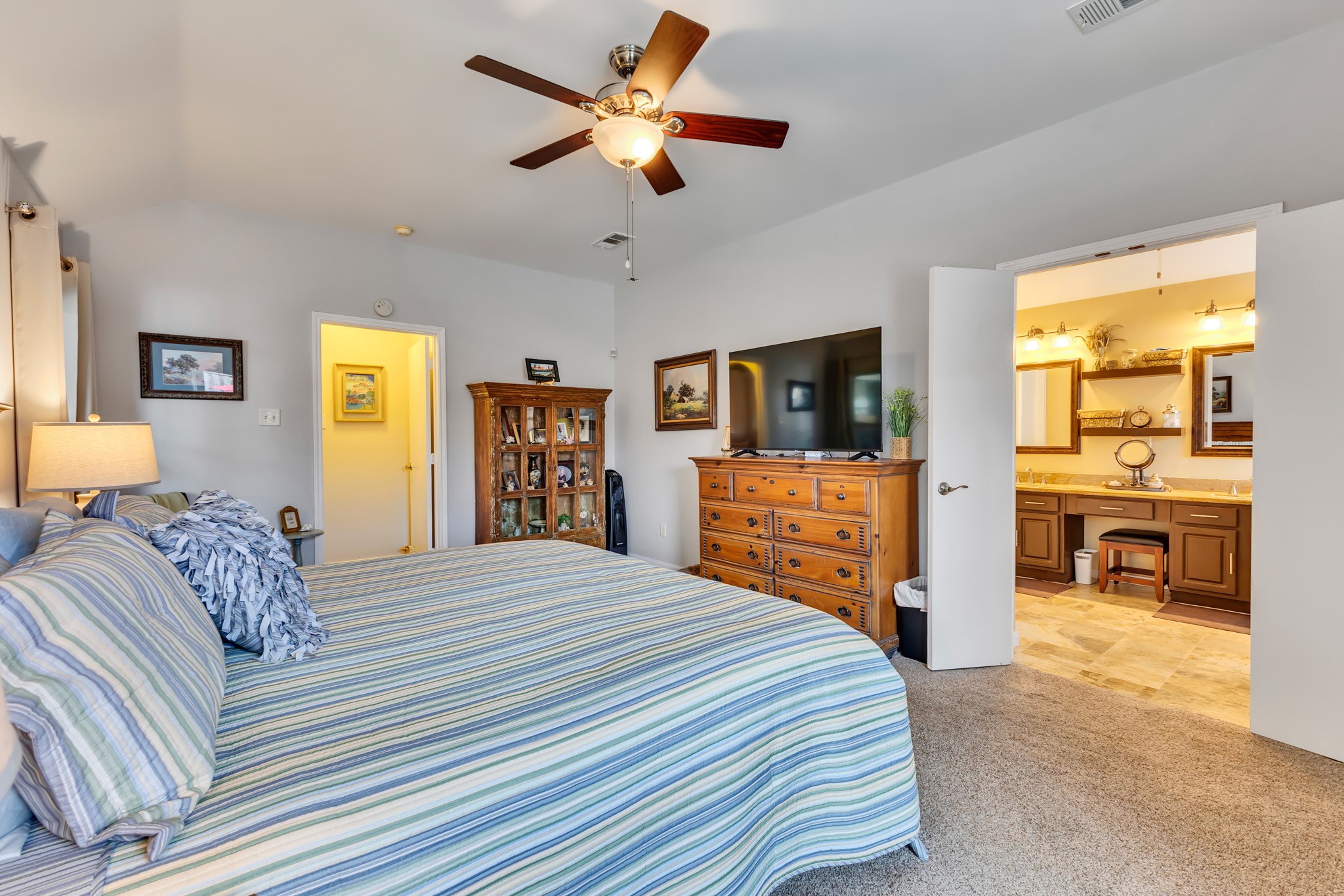 Another view of primary bedroom.