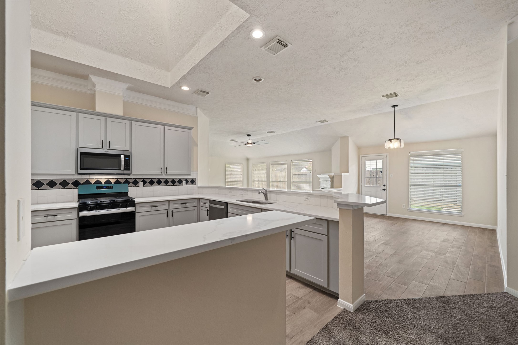 Plenty of counter space for convenient meal prep while also having a breakfast bar for entertaining