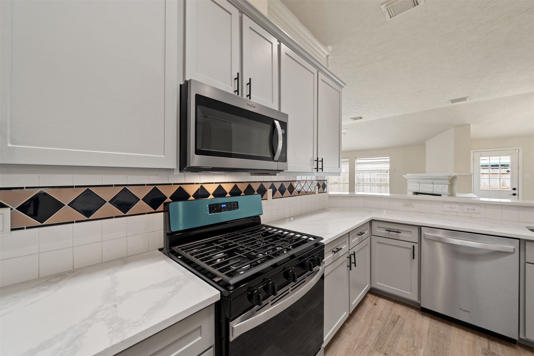 Modern design offering a bright and inviting space for cooking and entertaining.