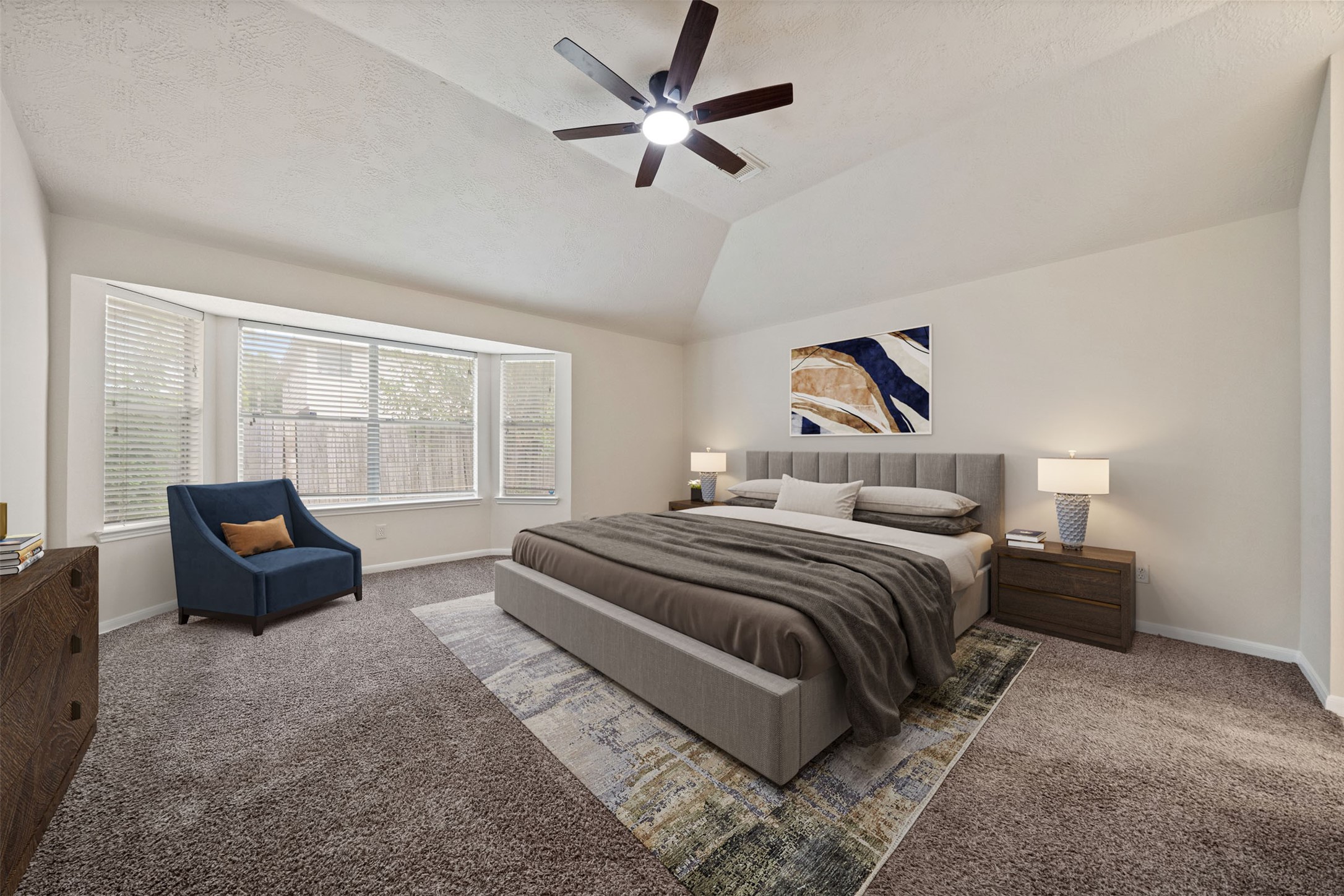 Experience the serenity of this primary bedroom suite, featuring a lovely seating area by the large bay window, perfect for relaxation and natural light. *virtually staged