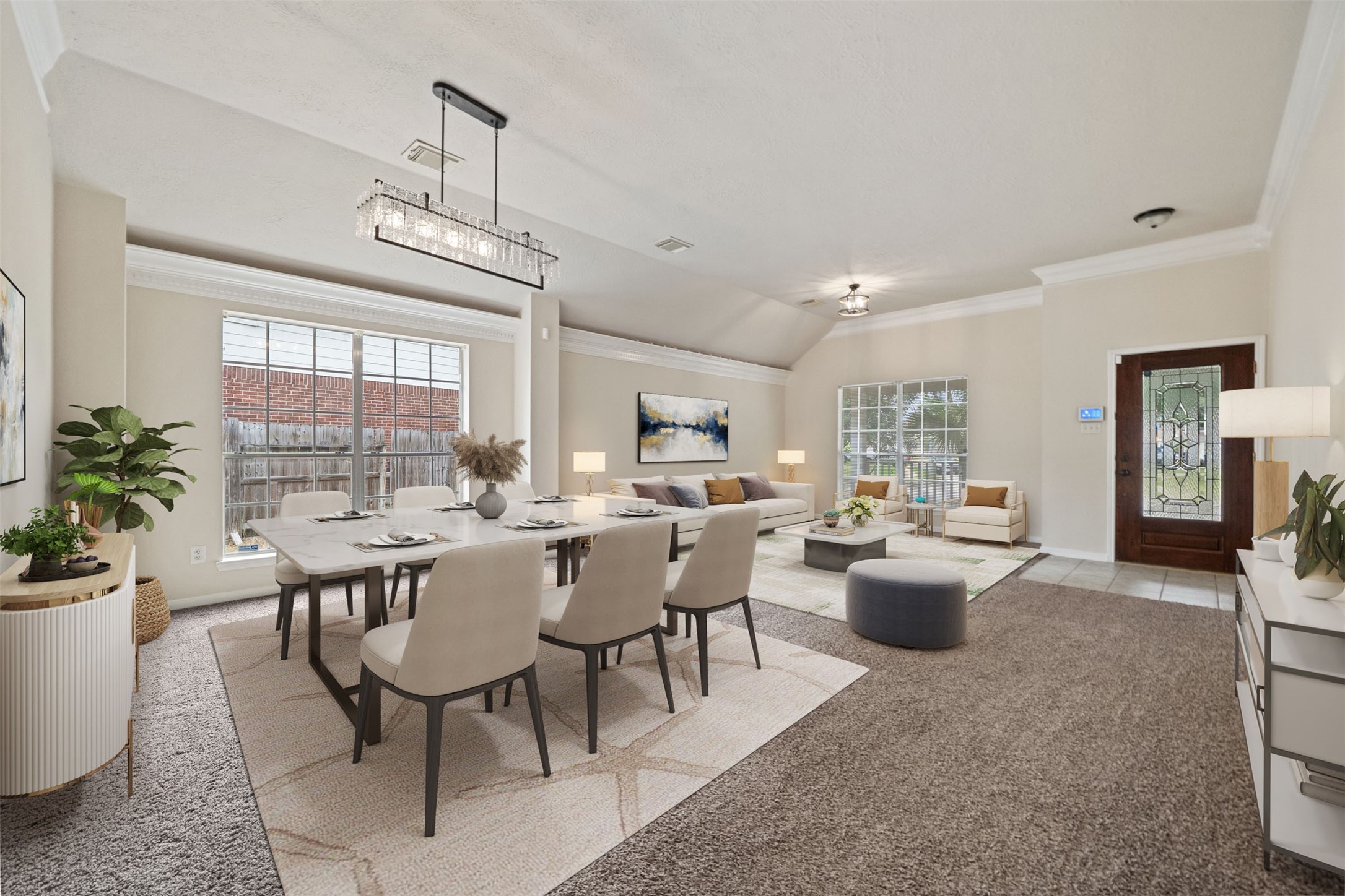 Spacious and inviting, this living and dining area features elegant light fixtures, abundant natural light, and a seamless flow perfect for entertaining. *virtually staged Spacious and inviting, this living and dining area features elegant light fixtures, abundant natural light, and a seamless flow perfect for entertaining. *virtually staged