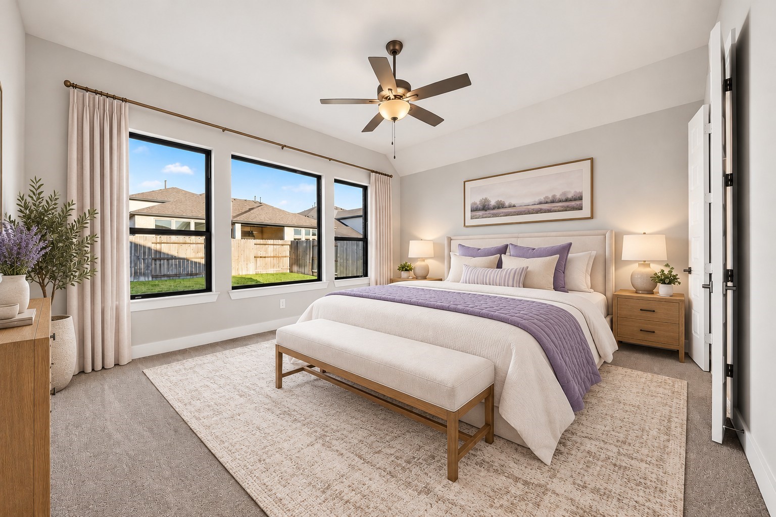 Primary Bedroom: Relaxing primary retreat featuring high ceilings, an impressive wall of windows, abundant natural light, and an inviting atmosphere.