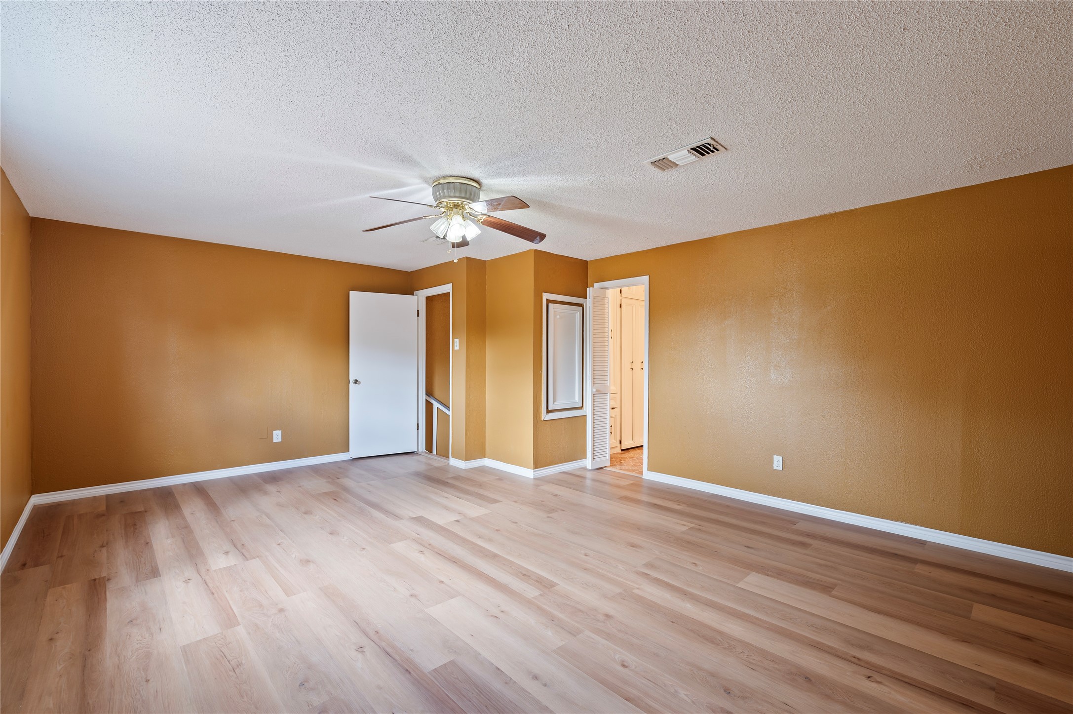 Another view of the spacious primary bedroom