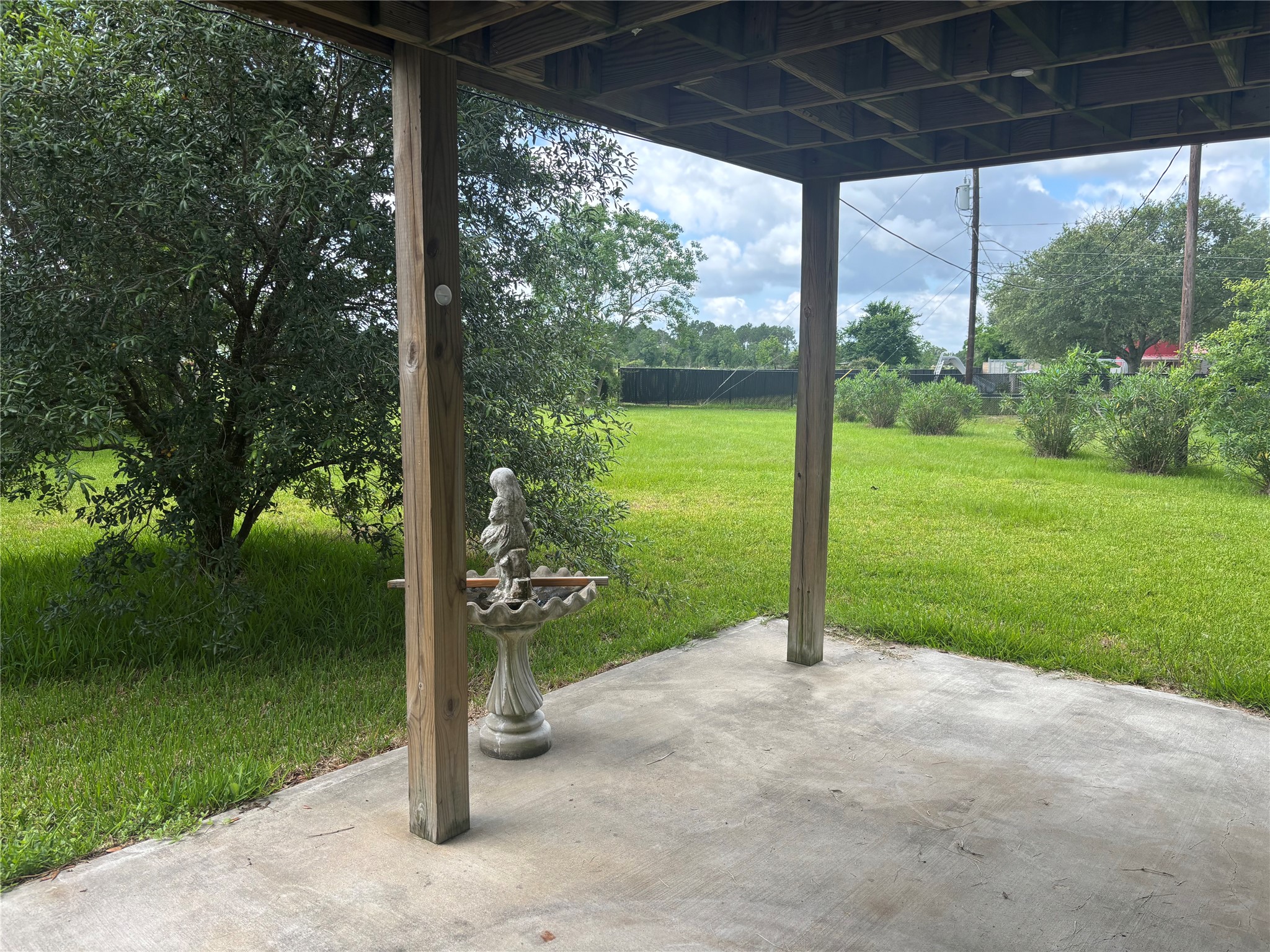 Serene lower-level patio with picturesque country views.