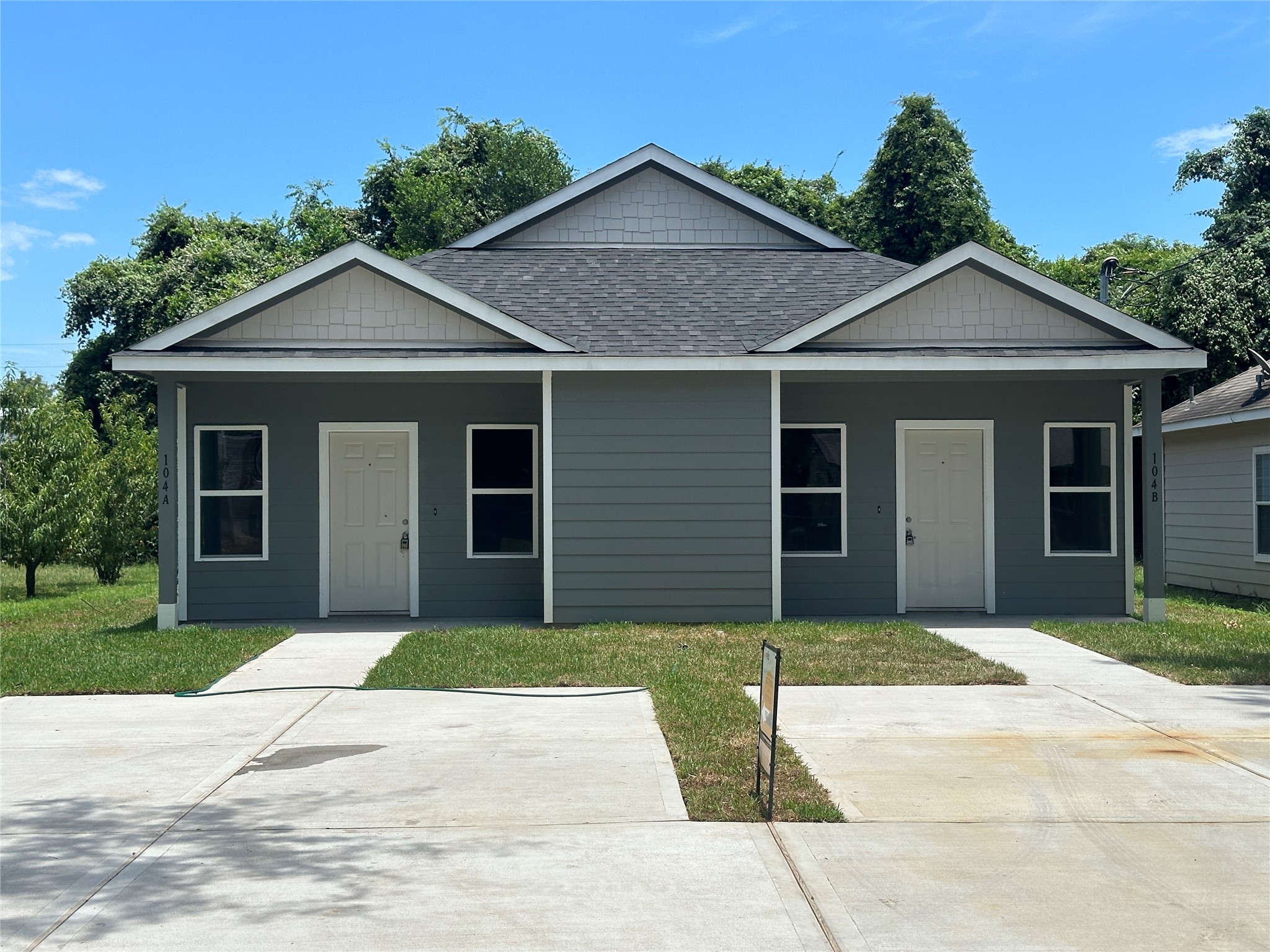 Welcome home to this well-appointed new construction duplex featuring separate entrances and dedicated driveways for each unit.