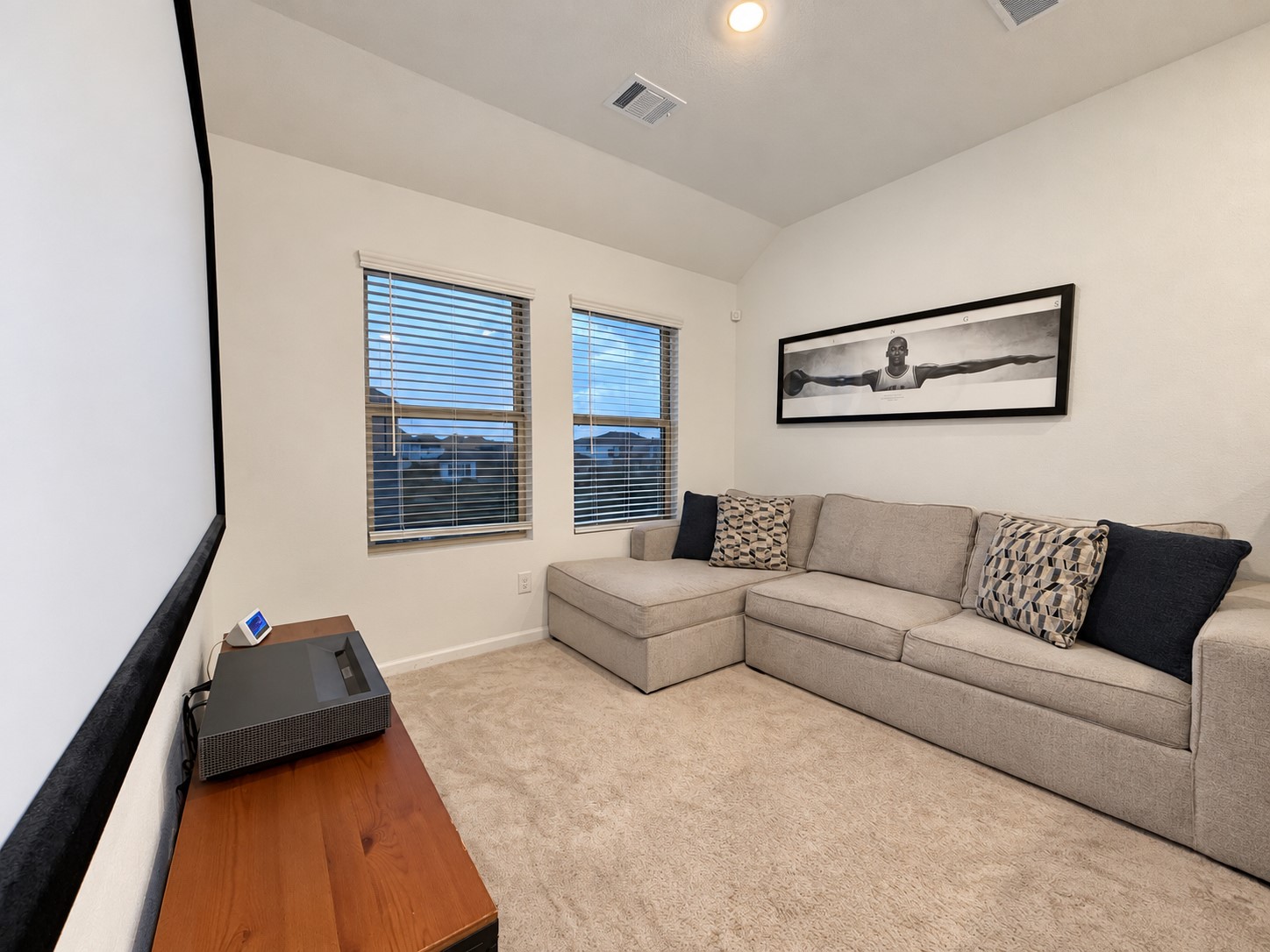 7. Upstairs loft offers flexible space for relaxing, movies, or a home office.