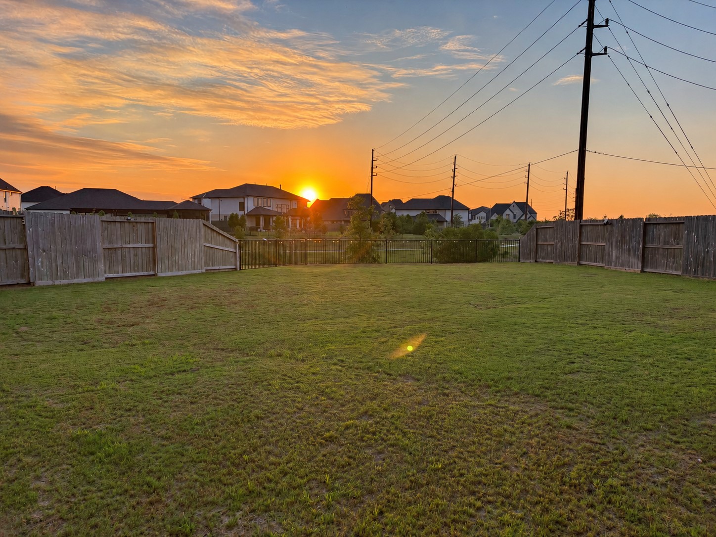 18. Sunset views from the spacious backyard.