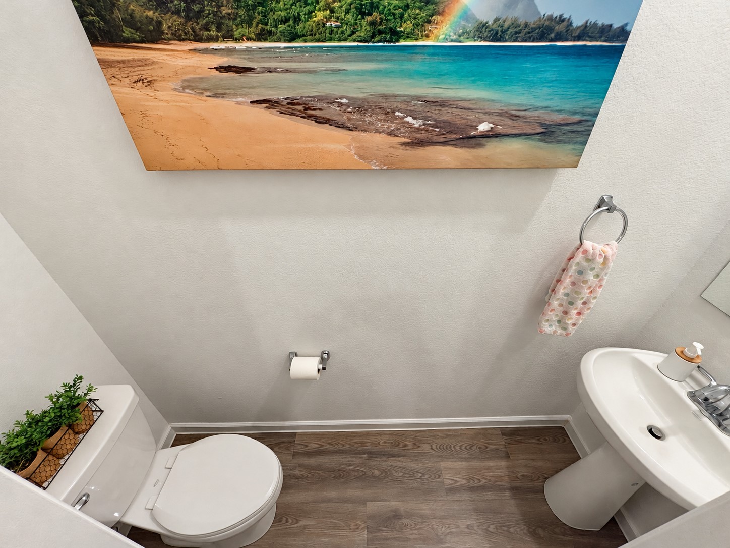 14. Half bathroom featuring a pedestal sink.