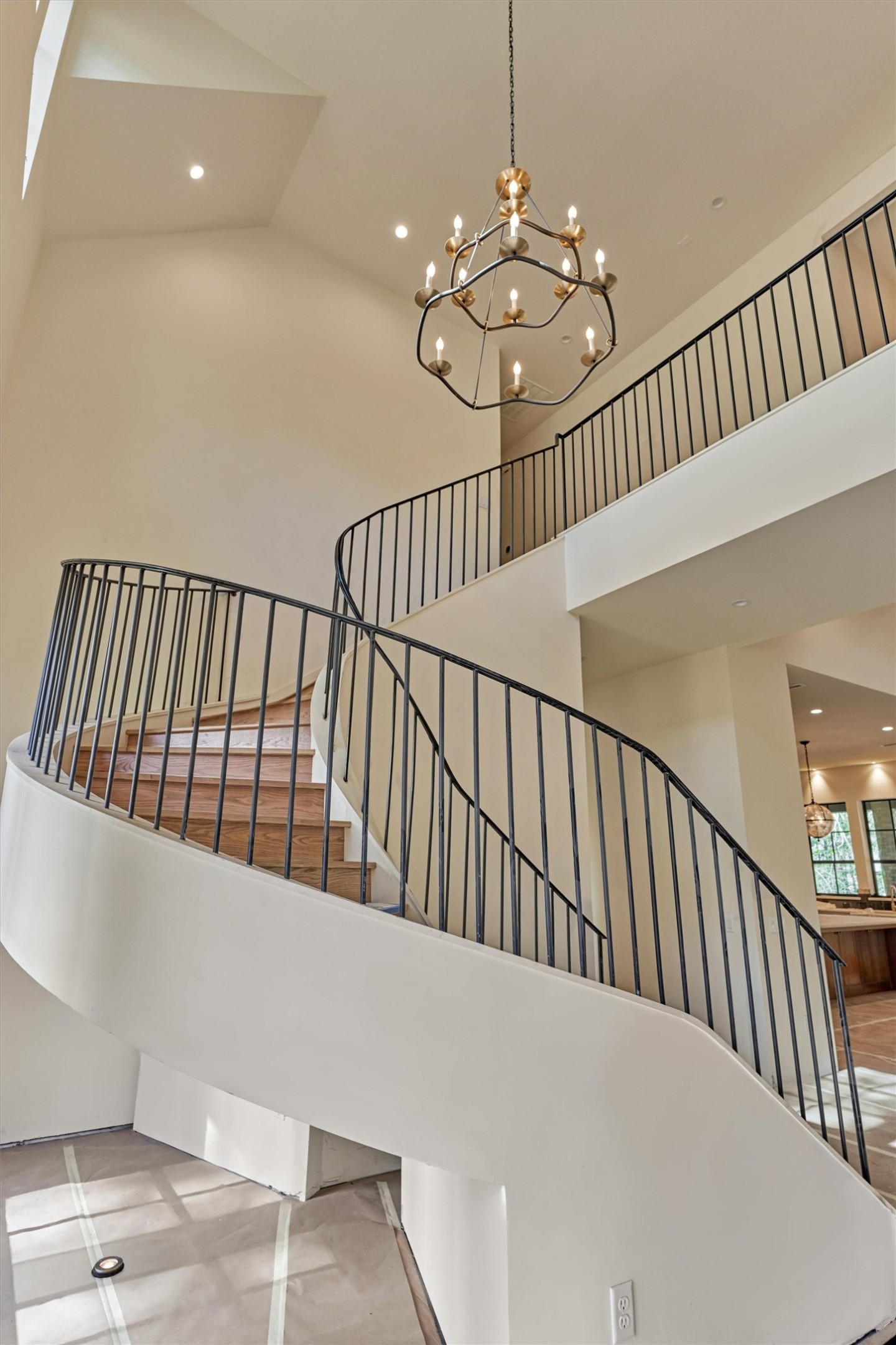 The floating spiral staircase represents a true architectural statement.