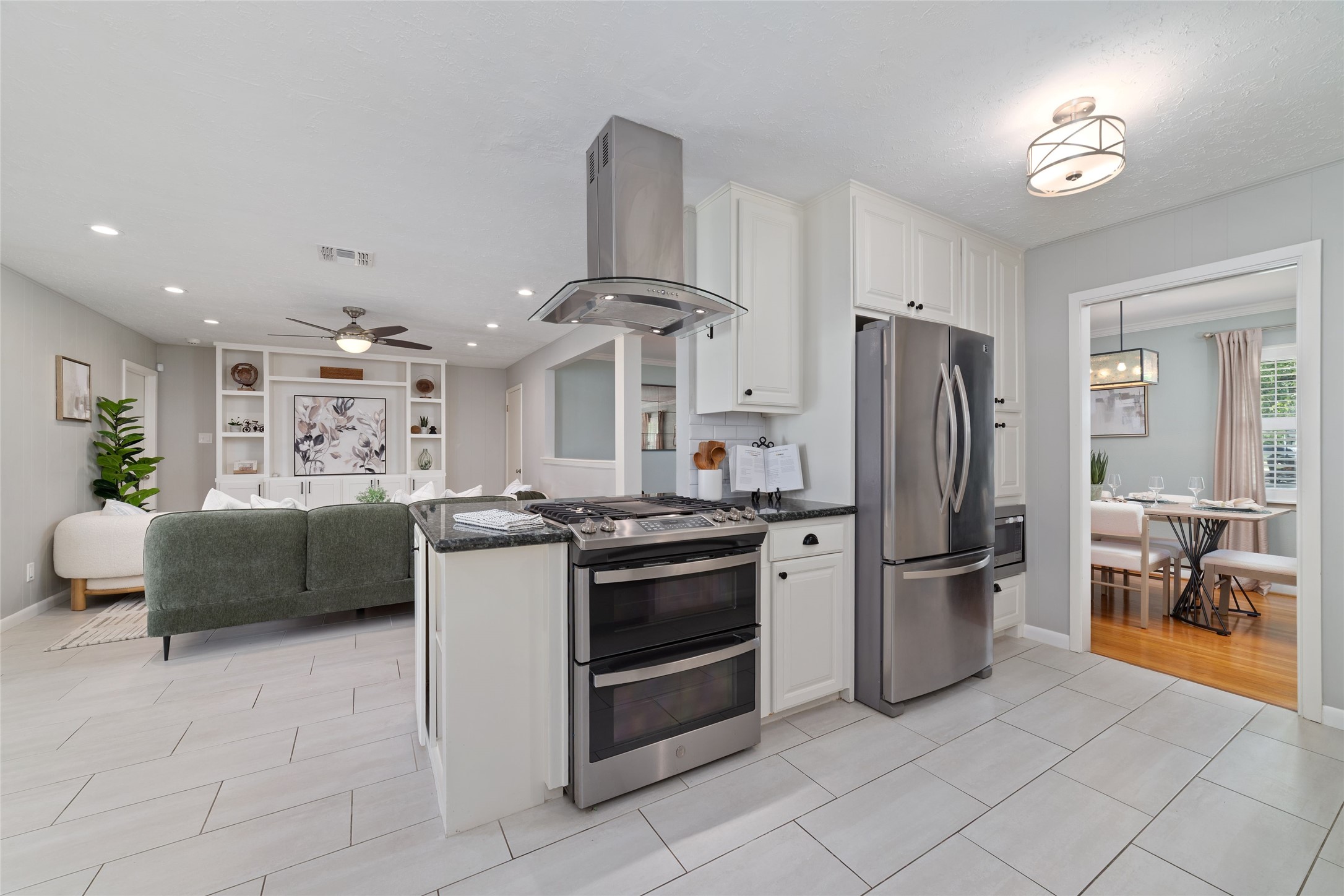 The kitchen flows into the living room, creating an inviting layout thats perfect for entertaining.