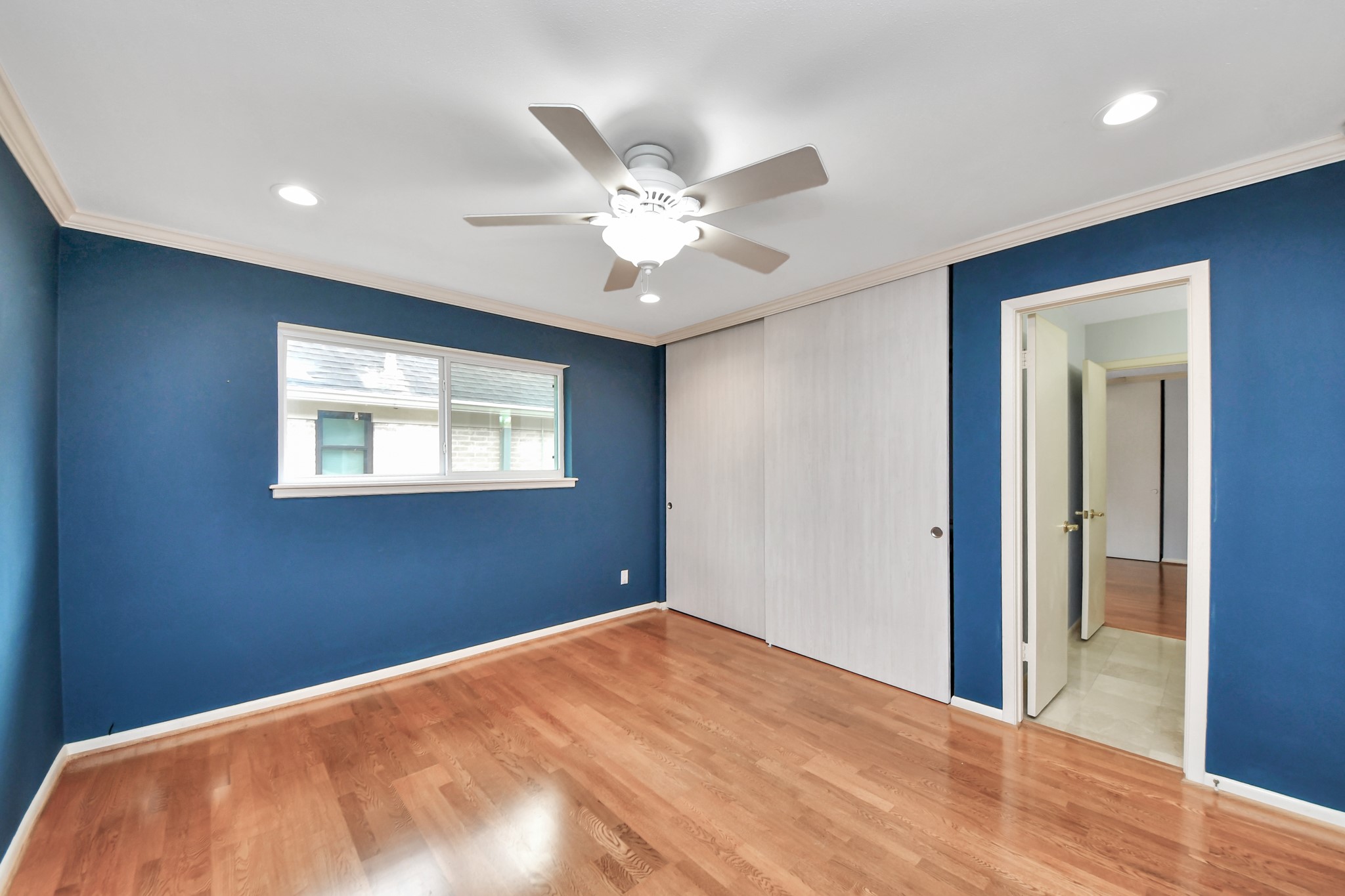 Secondary bedroom with recessed lighting, new double pane window and a spacious closet.
