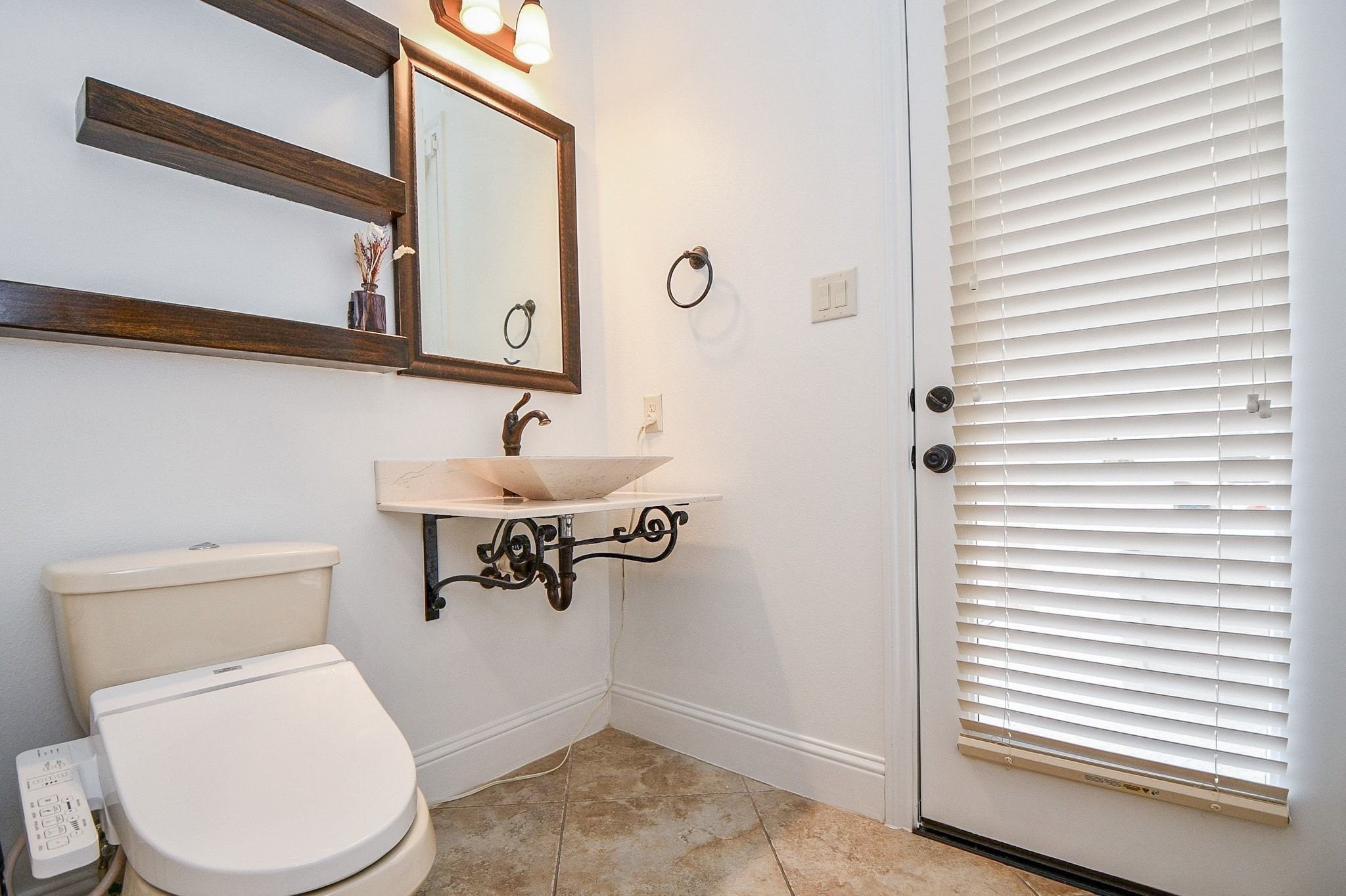 Half bath with access to pool/patio