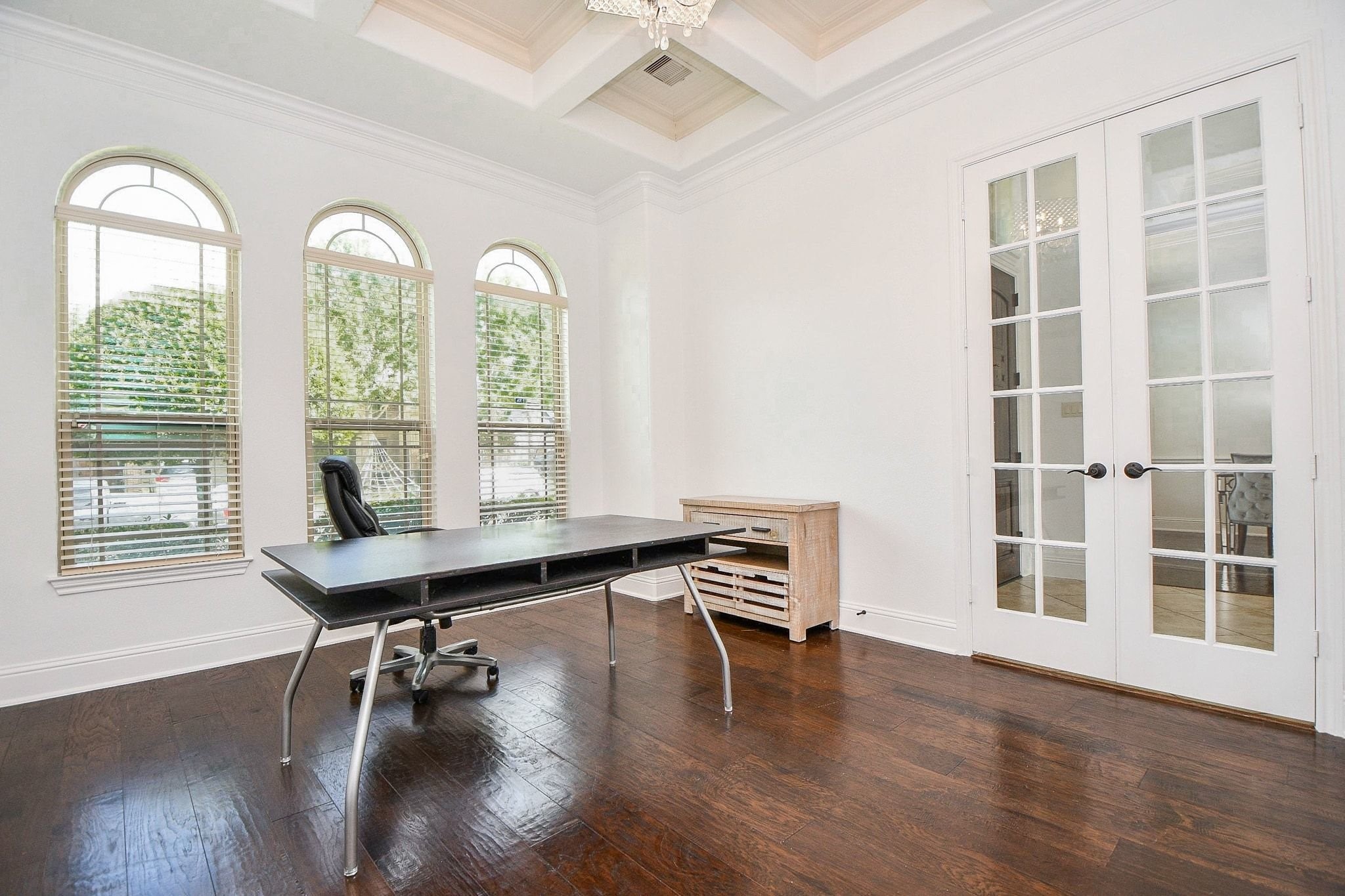 Home office/Study with French Doors, and custom ceiling.