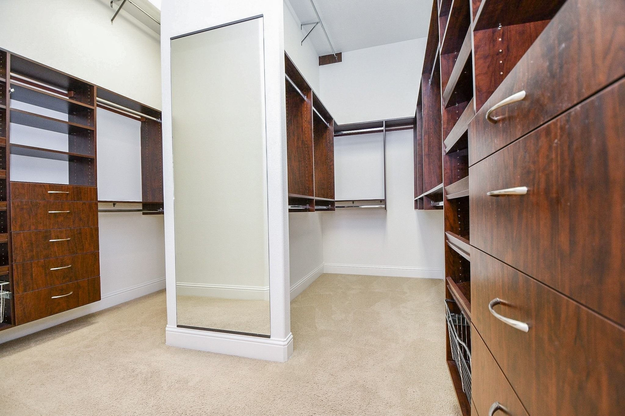 Large primary walk in closet, closet systems.