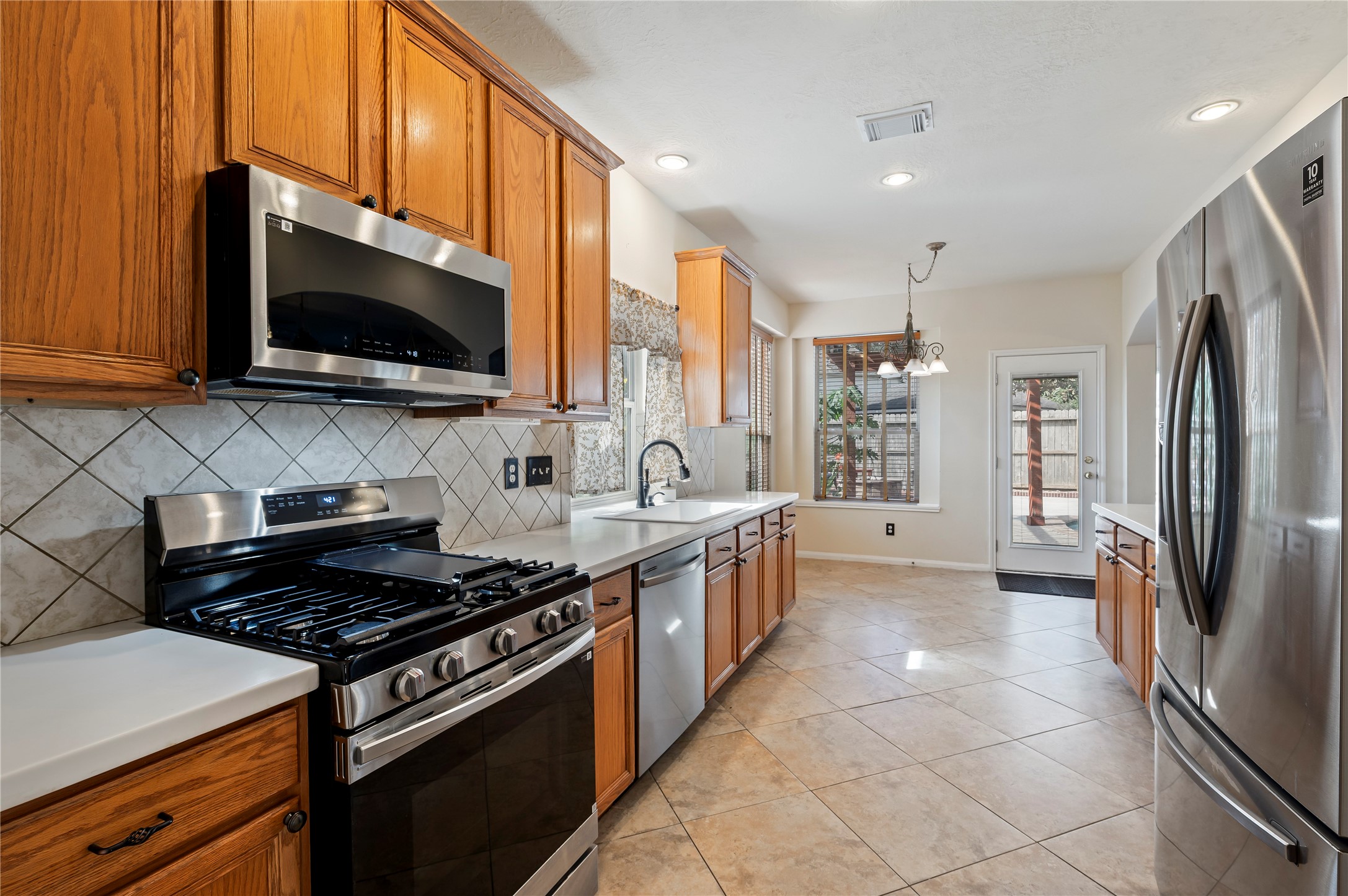 New microwave, oven, dishwasher, and the refrigerator stays with the home