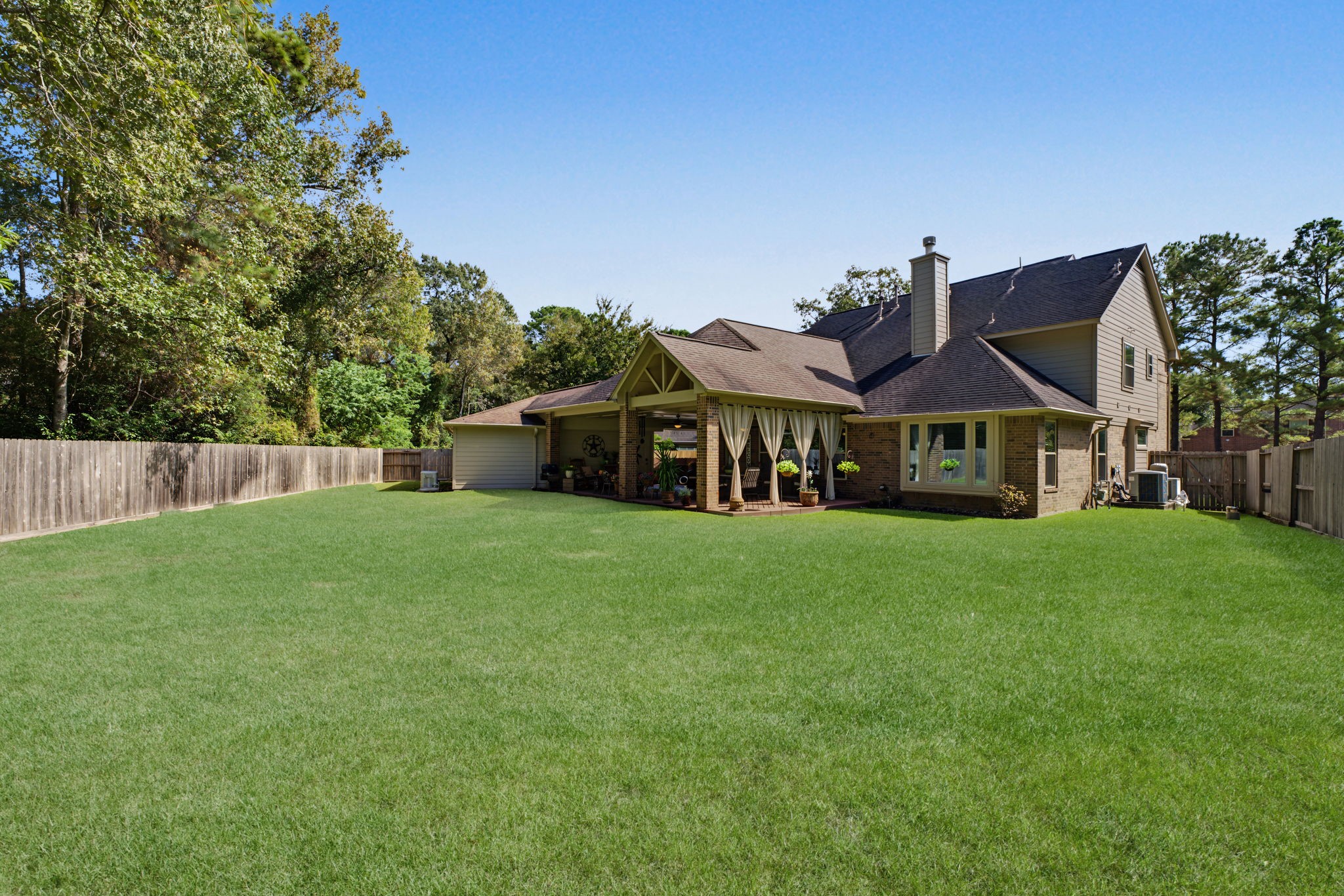 HUGE backyard! If you wanted to add a pool, you would have plenty of grass space left over.