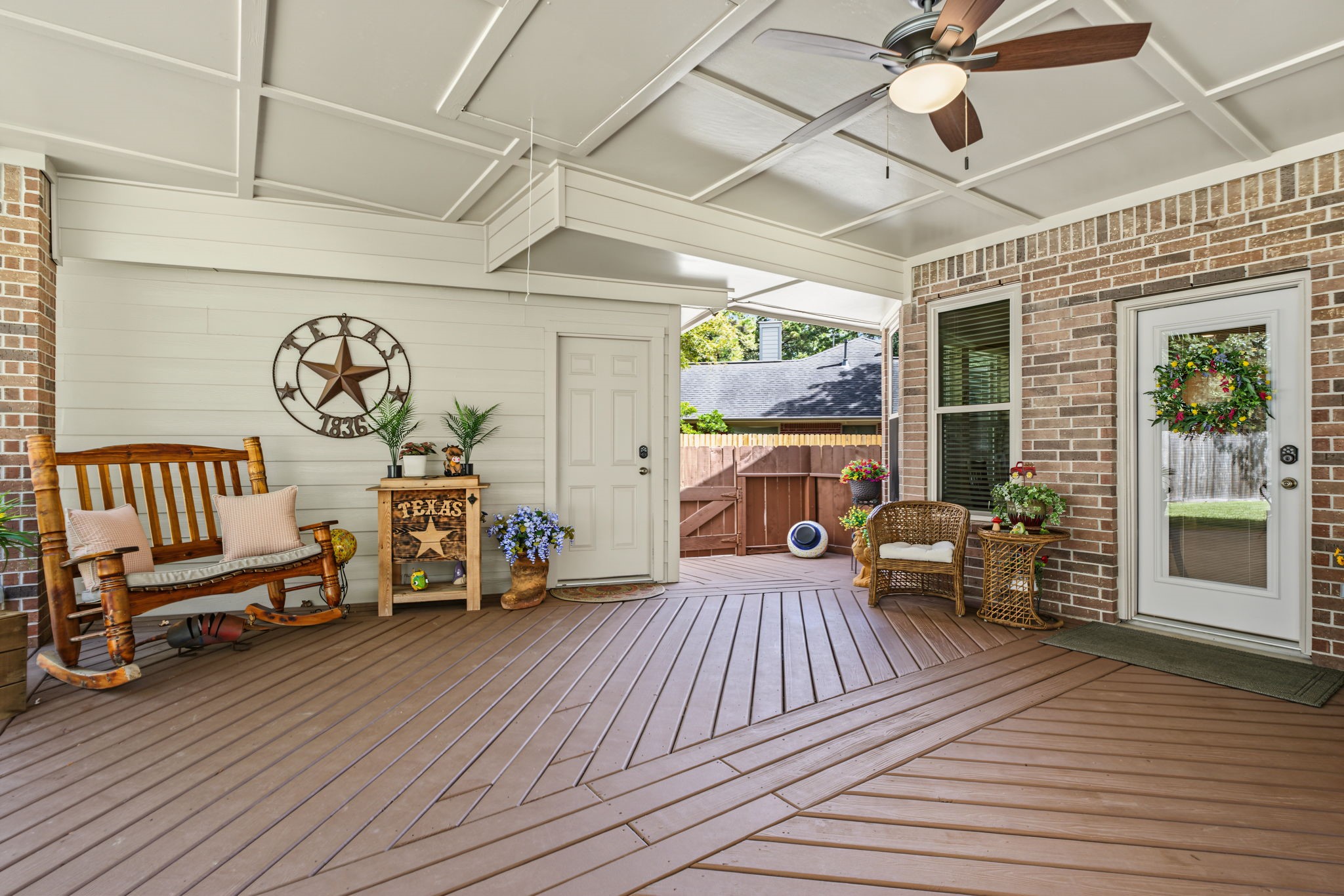 There is a drop down attic staircase that leads up to decked storage space in this ceiling!