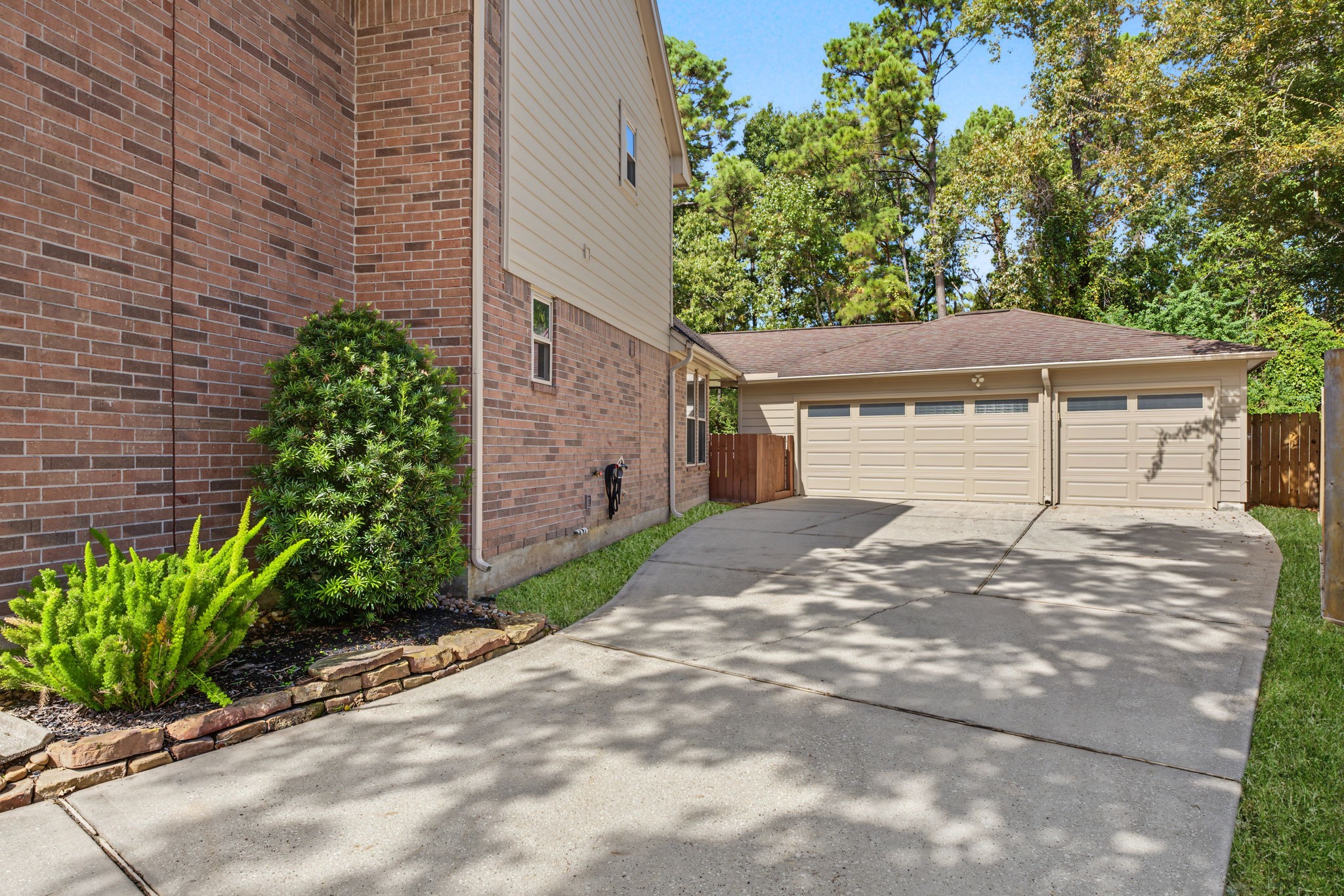 This detached 3-car-garage has an extra 5' bump space in the back corner that is perfect for a workshop area.