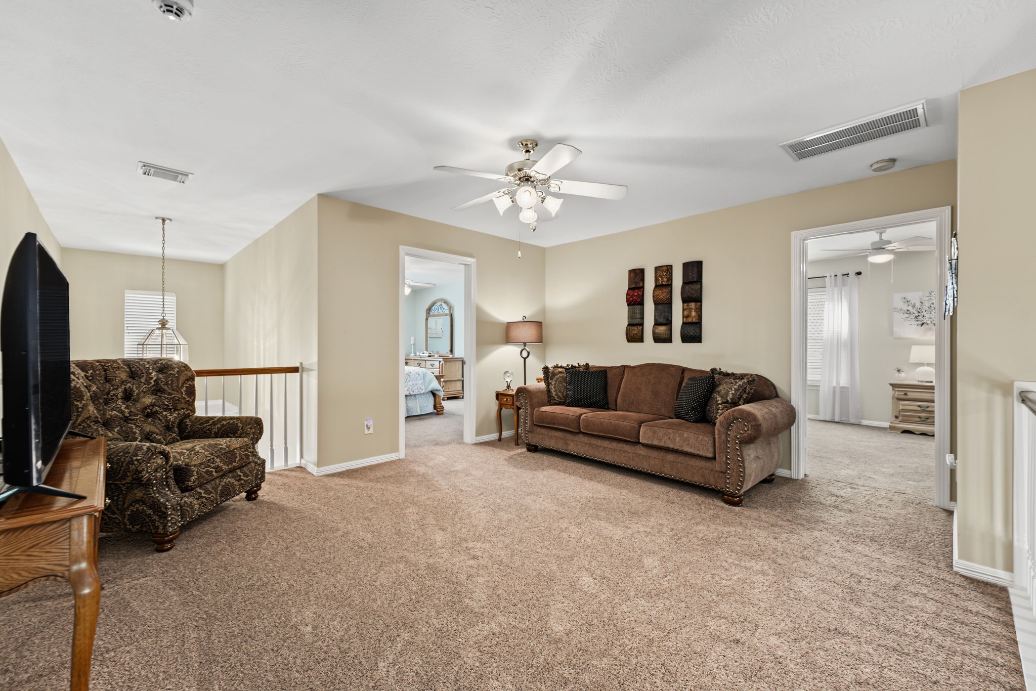 Upstairs, there is a Game Room that serves as a living room for the 3 upstairs bedrooms.