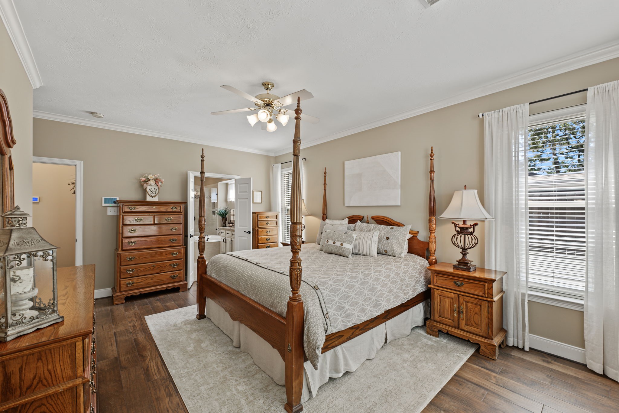 The Primary Bedroom can hold a King-sized bed, 2 large night stands, 2 large dressers, and still have space left over.