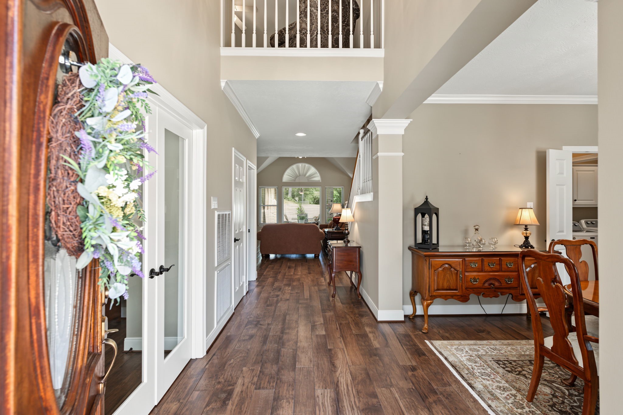 Upon entry, the wood-look tile floors flow from front to back. Private Study/Office to the left and Dining Room to the right.