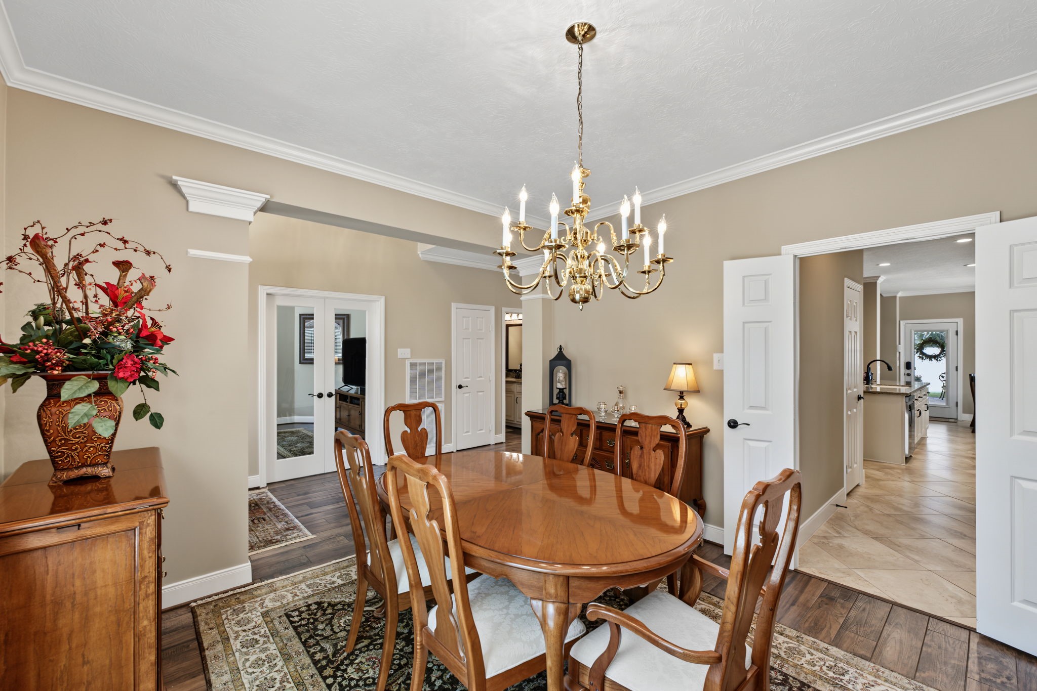 View from corner of Dining Room showing the connection to the Kitchen with double doors closing it off.