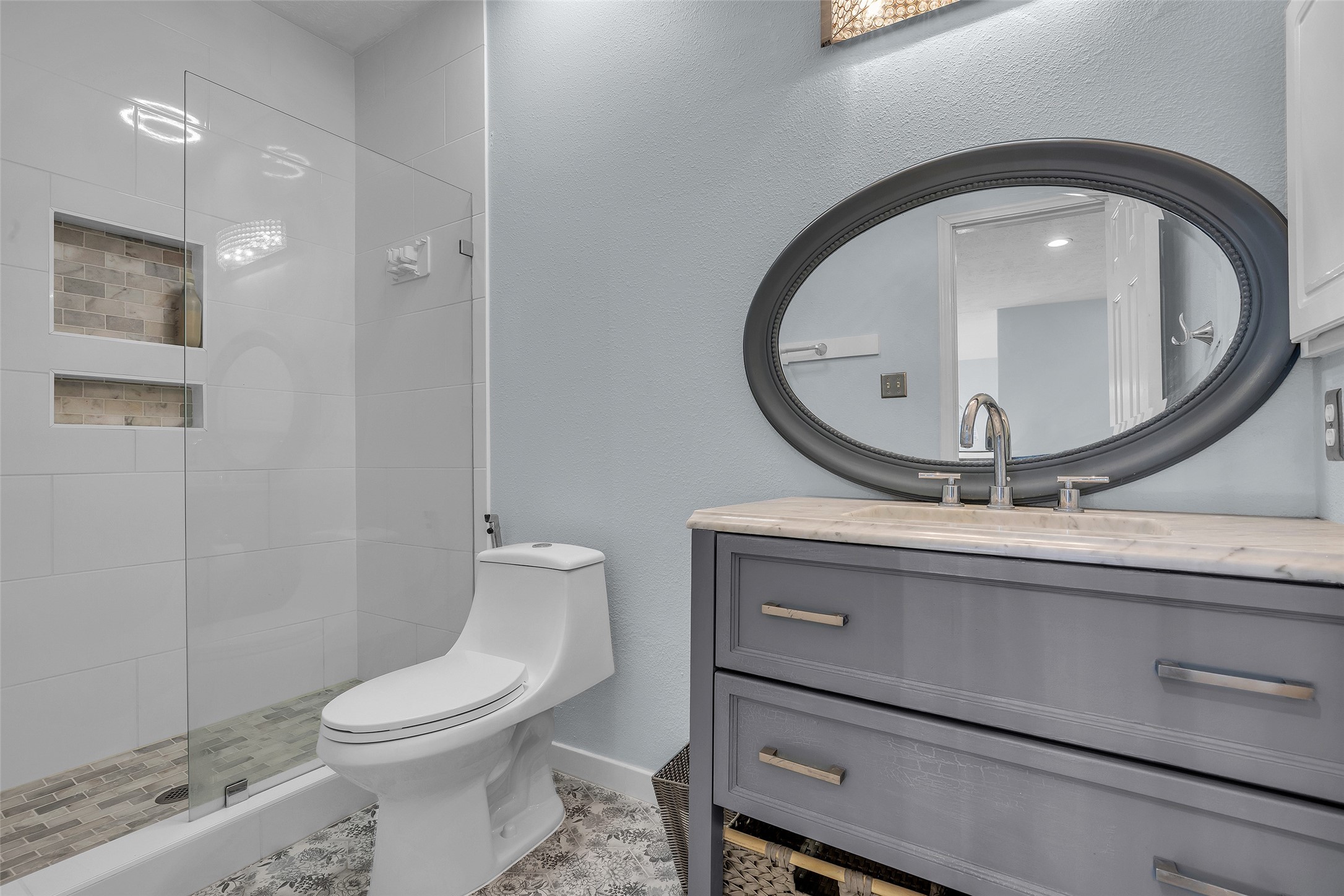 Fully updated secondary shower is a stunner. Tile all the way up extending sight lines. Notice the new high end vanity.