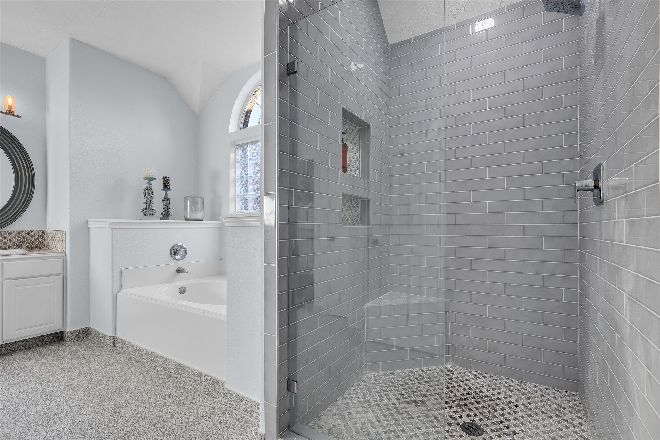 Absolutely huge shower with great tile work.
