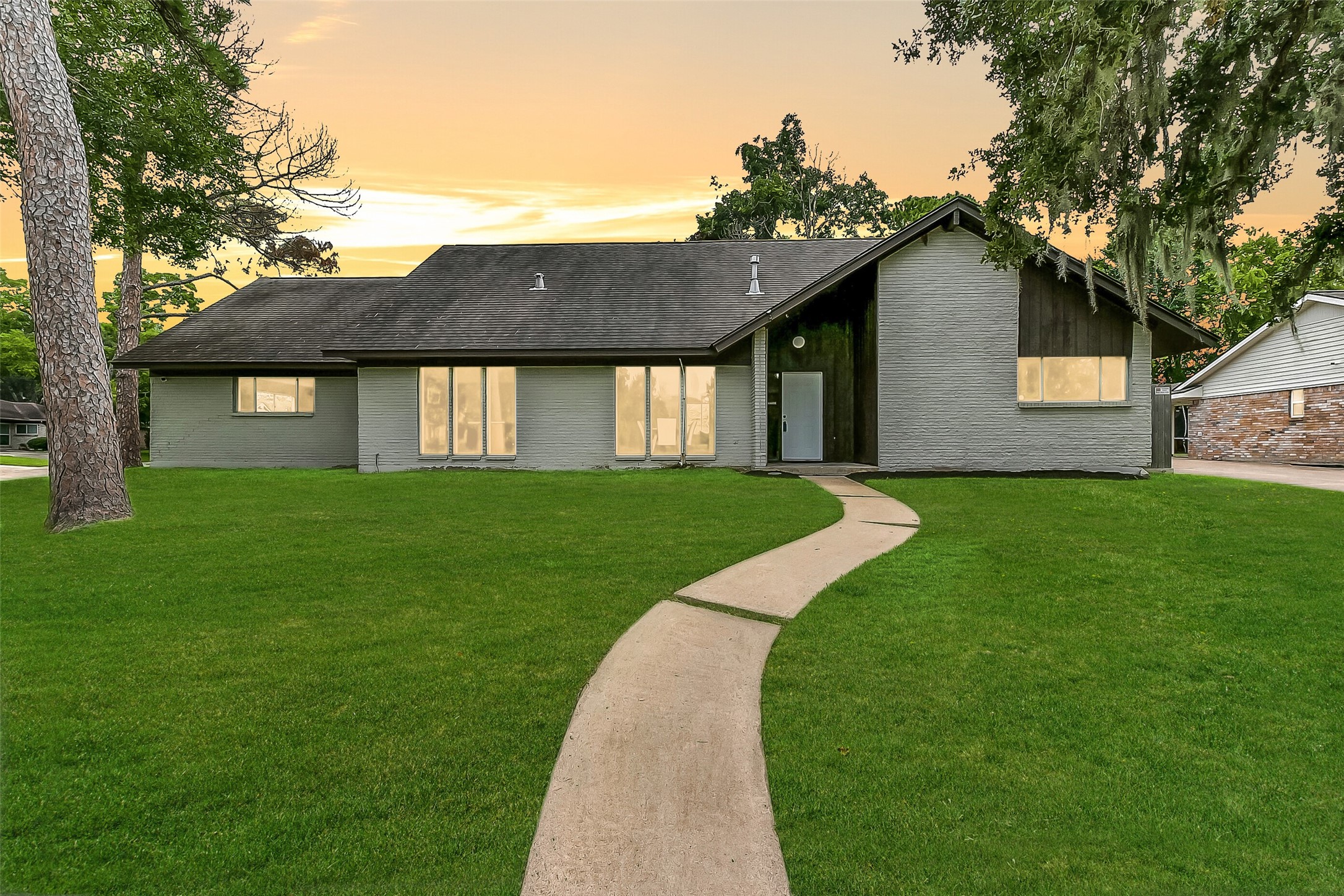 Situated on a large corner lot with a high elevation in the established Wedgewood Village community, this two-story 5-bedroom home is framed by towering, moss-draped trees and offers a park like setting within the boudaries of CCISD.