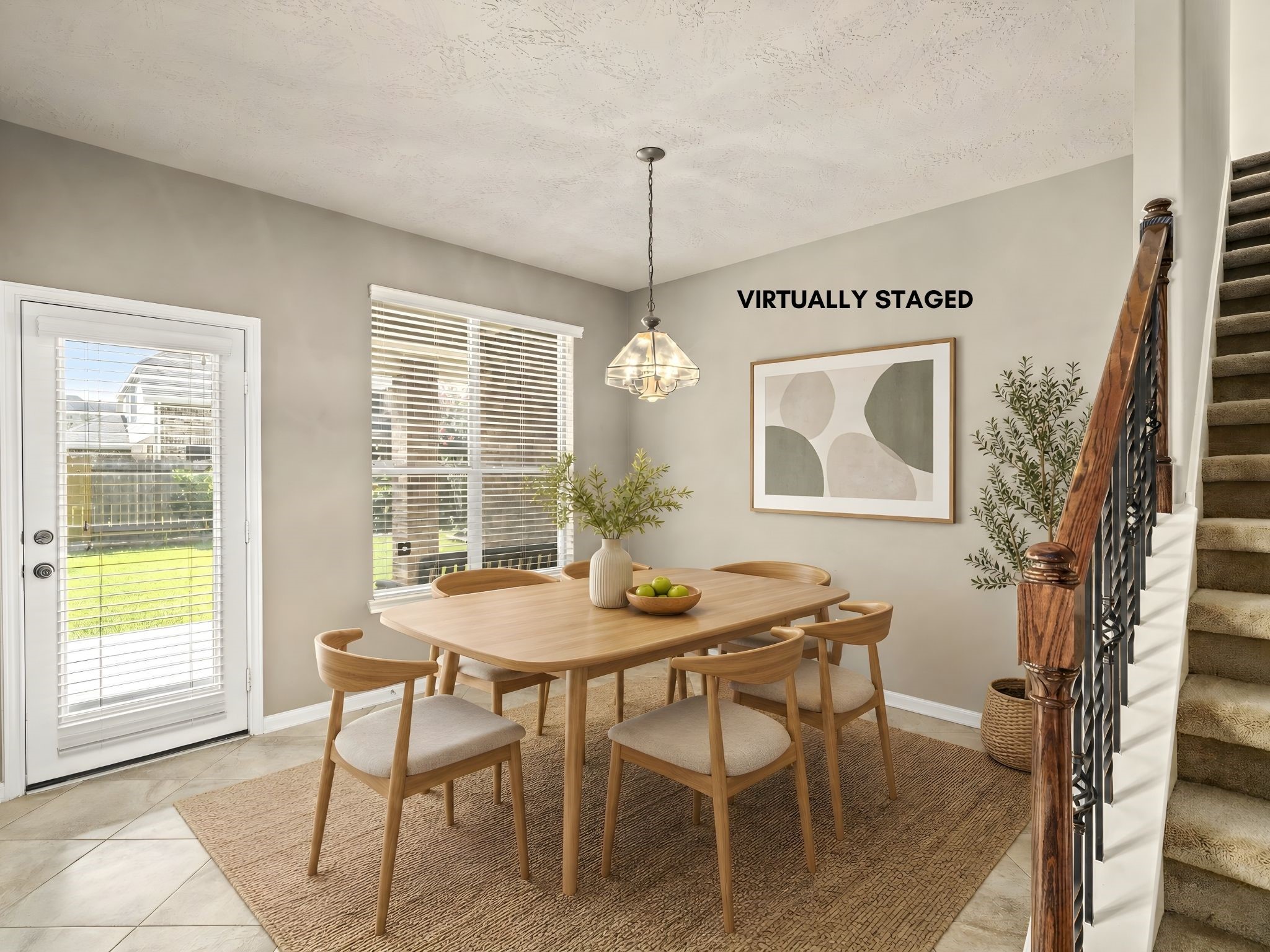 A picturesque breakfast room with rich tile flooring, framed by oversized windows that flood the space with natural light. Virtually staged for effortless morning elegance.