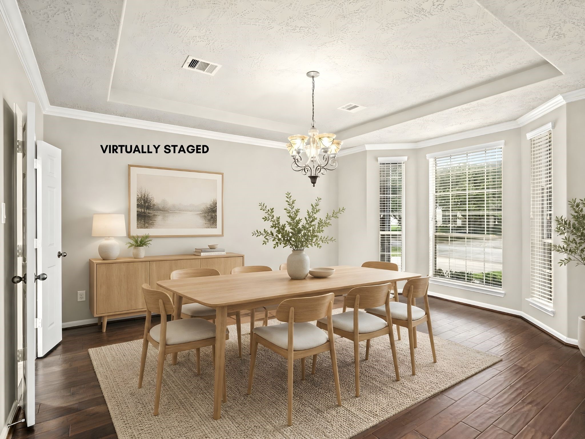 The formal dining room is the picture of sophistication, wood flooring, abundant natural light, and refined virtually staged decor create the perfect setting for elegant gatherings. The formal dining room is the picture of sophistication, wood flooring, abundant natural light, and refined virtually staged decor create the perfect setting for elegant gatherings.