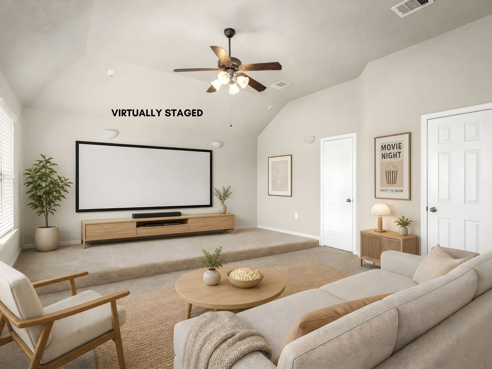 An impressive media room complete with a walk-in closet and attached bath, virtually staged to capture its cinematic potential, the perfect private screening retreat.