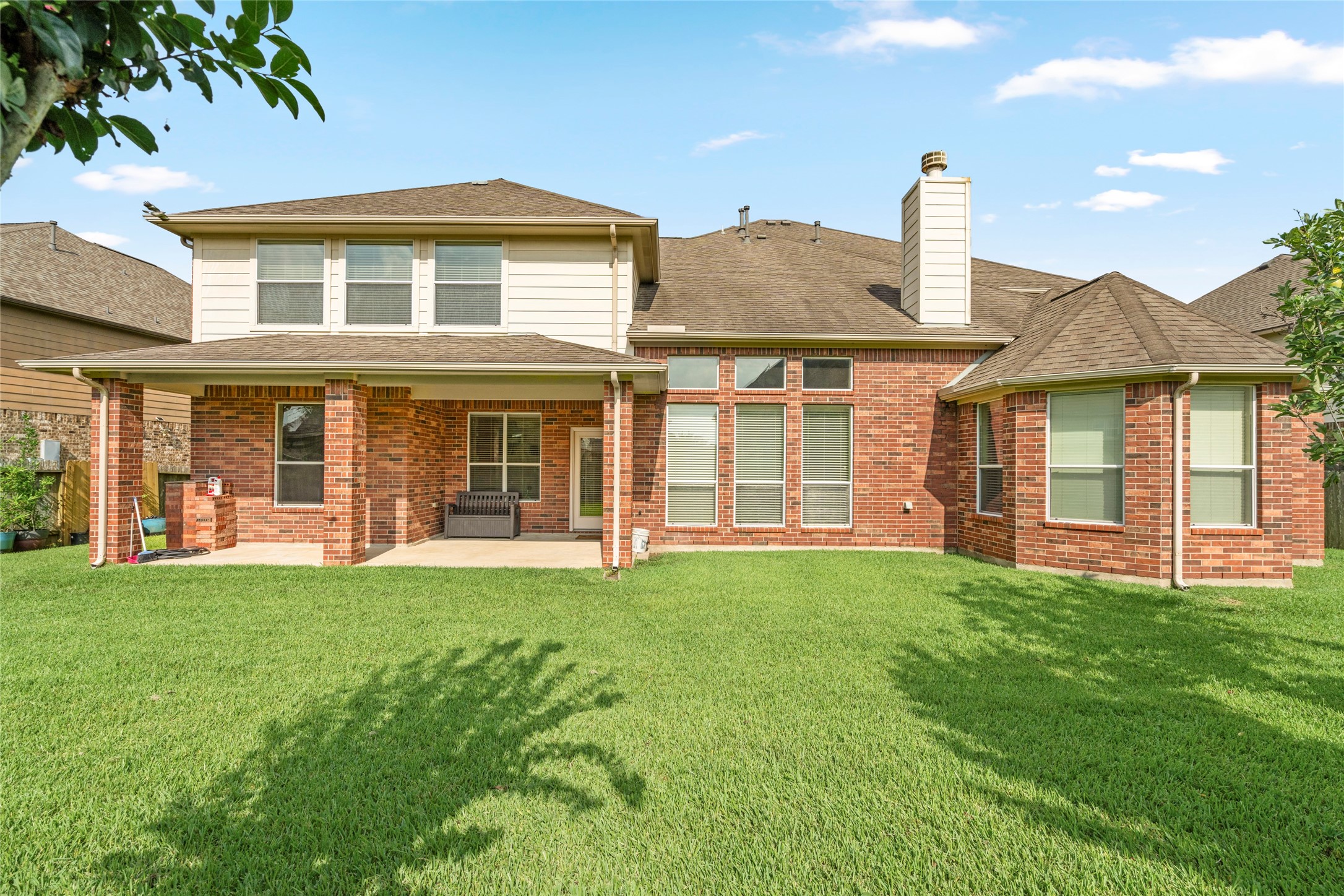 An exceptional outdoor canvas awaits, with sprawling green space and mature trees offering both beauty and privacy for the next homeowner.