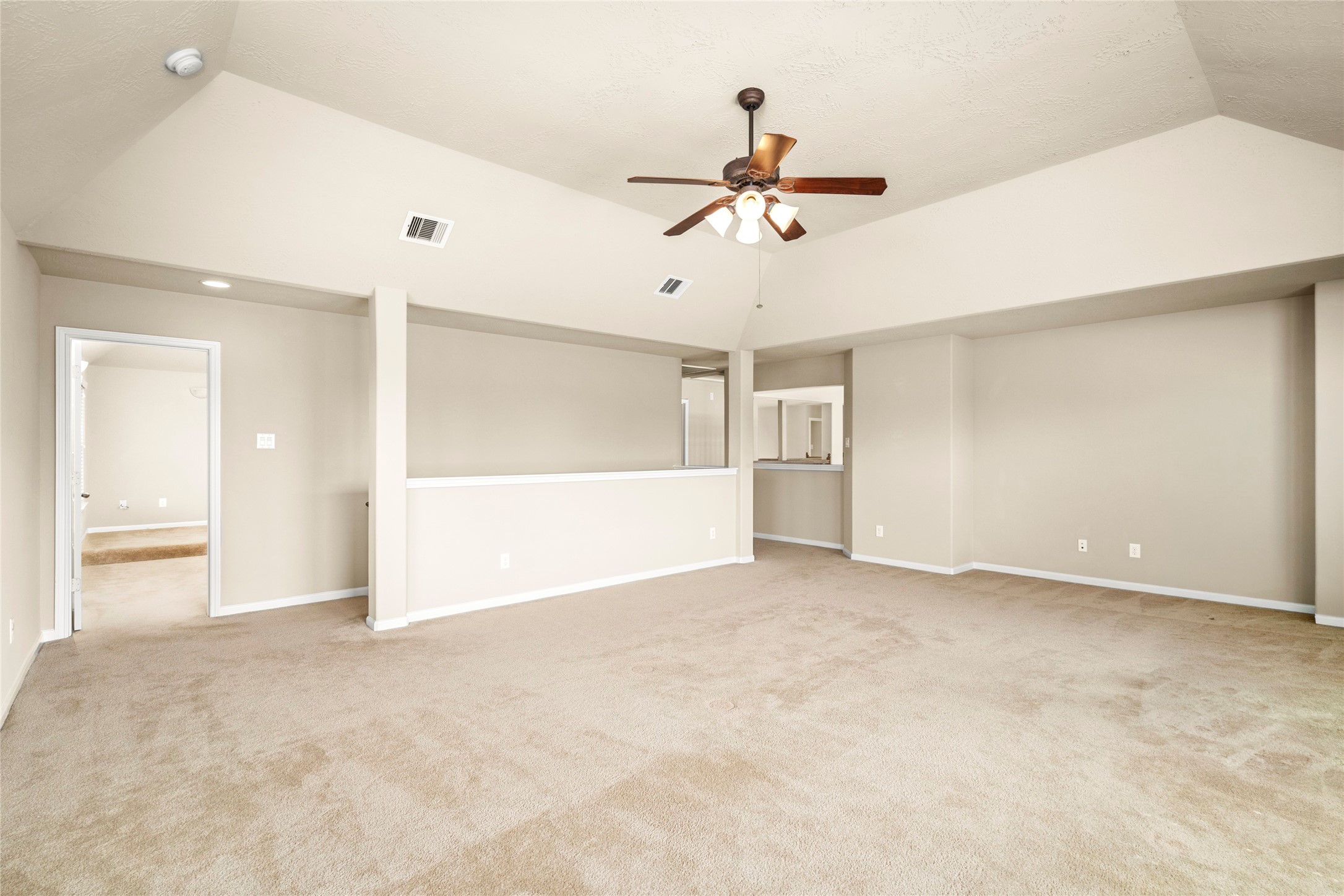 Generously proportioned and full of natural light, this versatile game room offers limitless possibilities, from movie nights to a private play space.