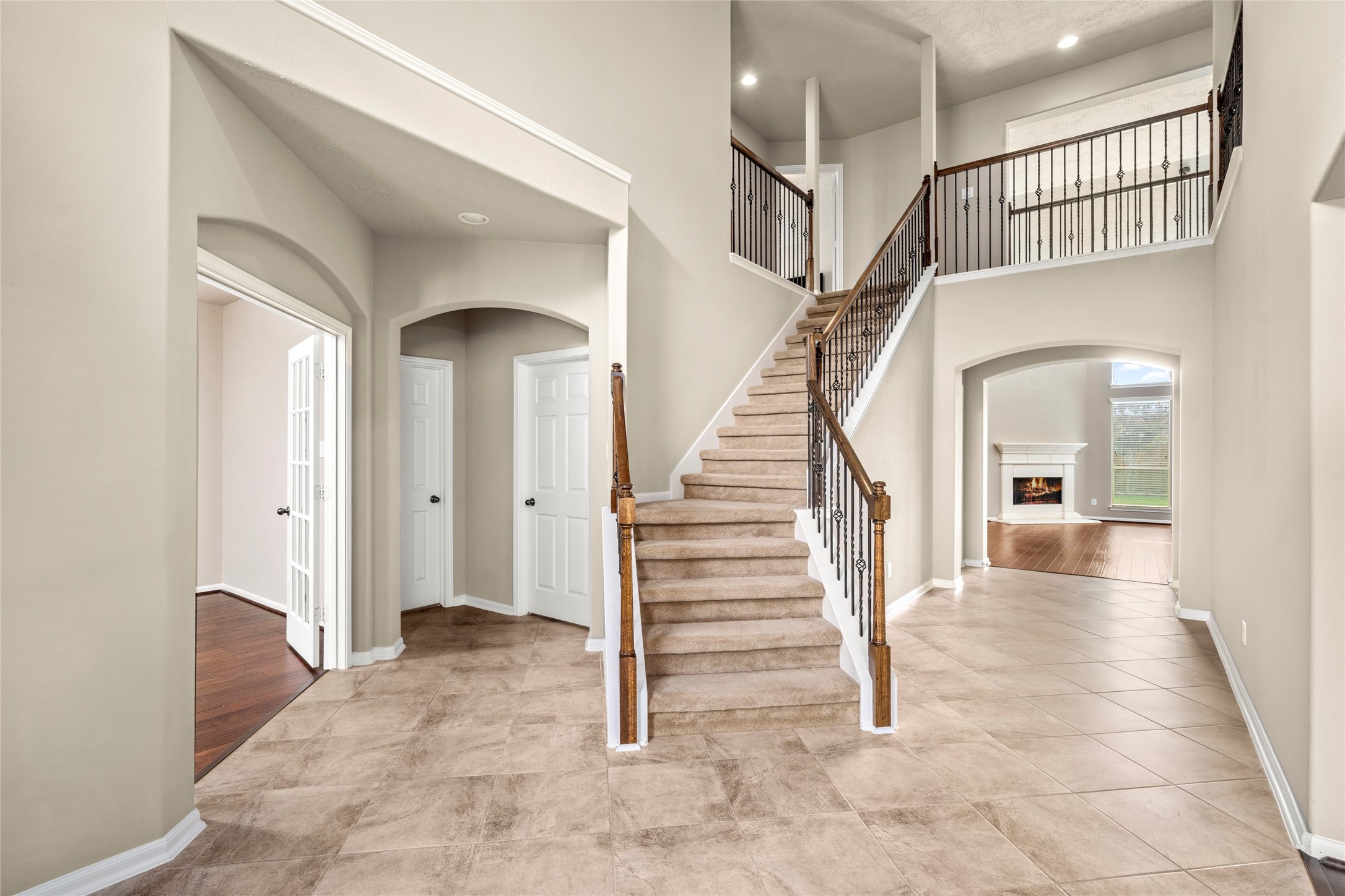 From the moment you enter, the home unfolds beautifully  a refined home office to the left and an inviting living room straight ahead, all connected by an effortless, open-concept flow.